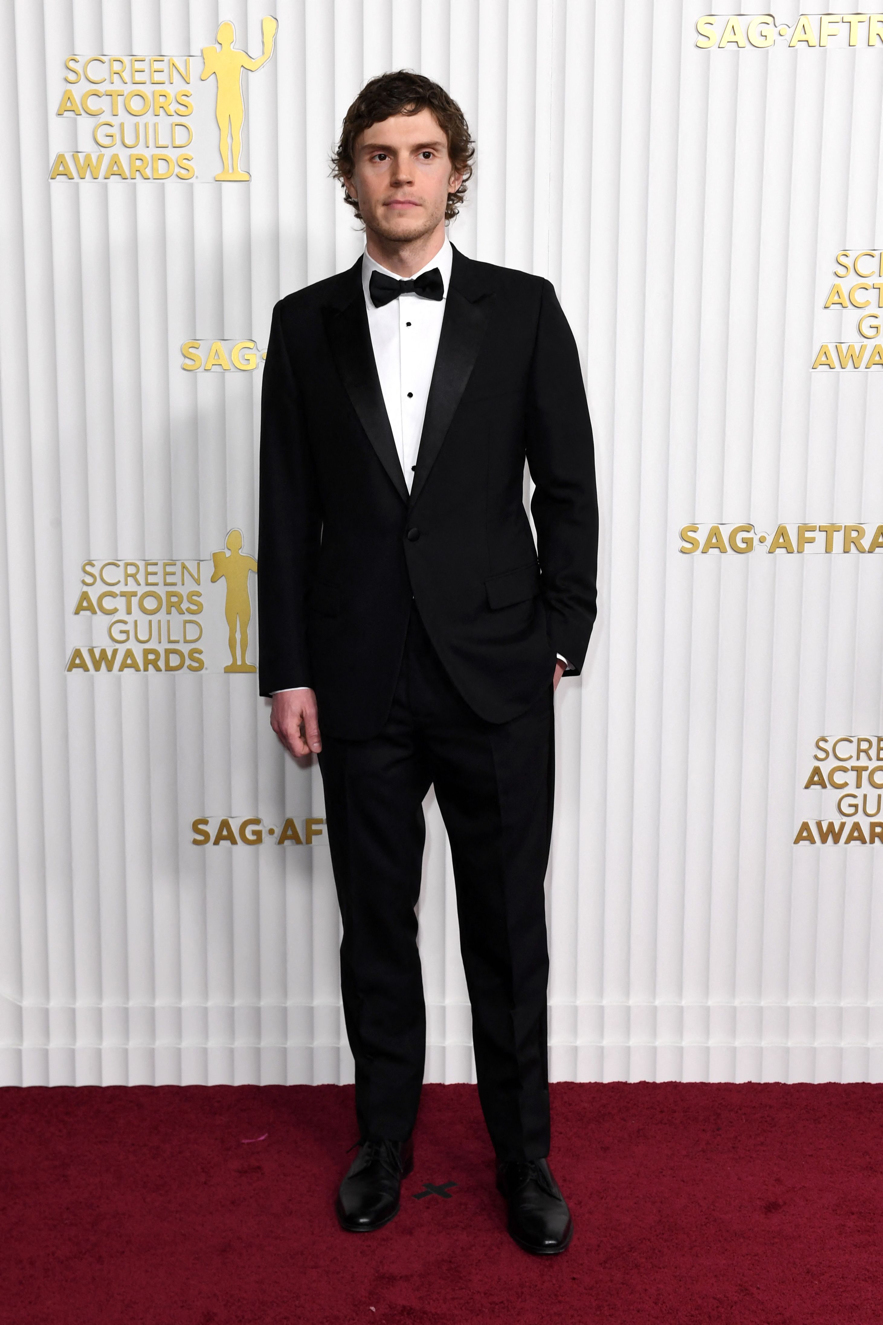 US actor Evan Peters arrives for the 29th Screen Actors Guild Awards at the Fairmont Century Plaza in Century City, California, on February 26, 2023. | Source: Getty Images