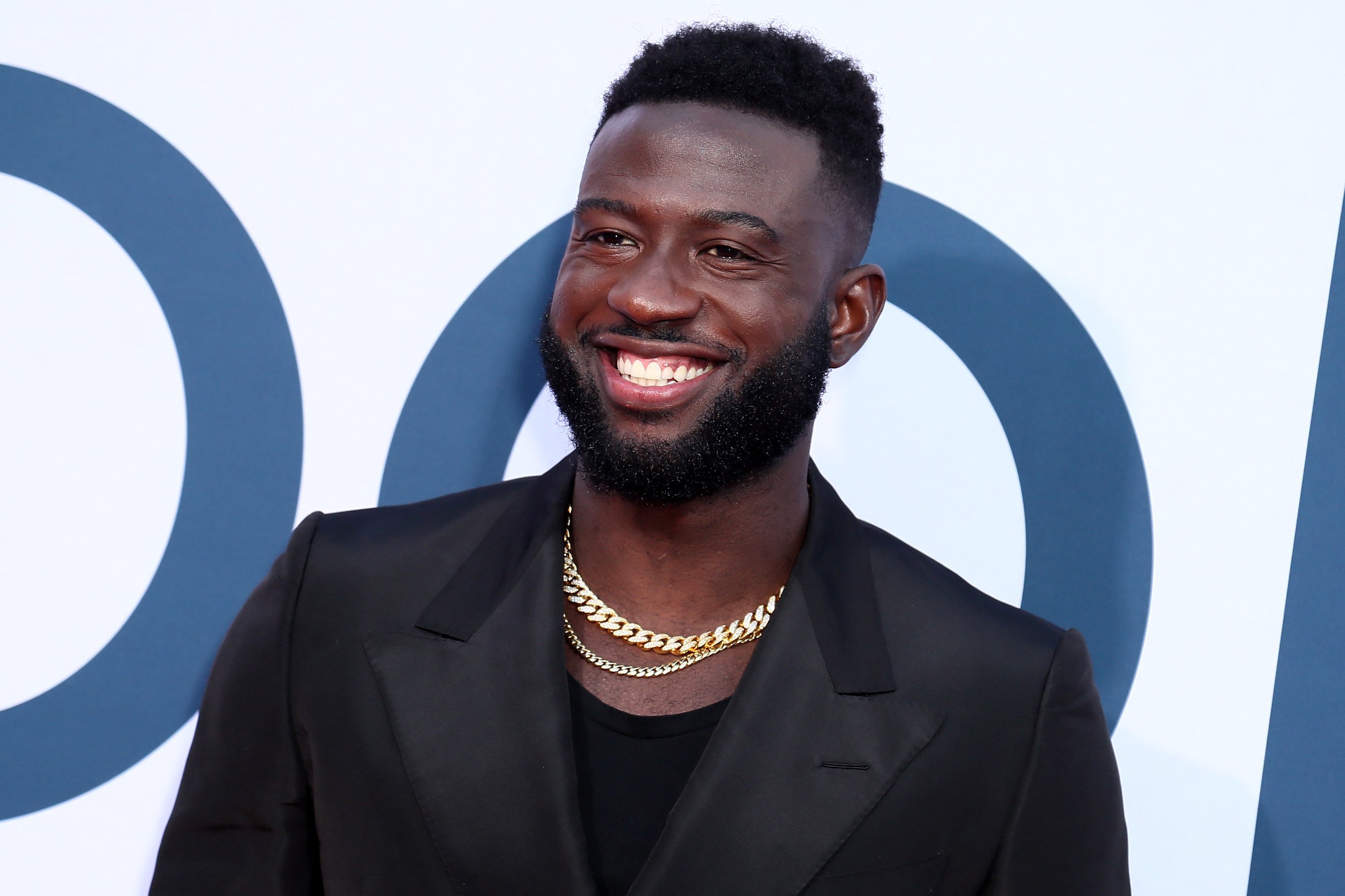 Sinqua Walls attends the Photo Call For Netflix's "Otherhood" at the Egyptian Theatre on July 31, 2019 in Hollywood, California. | Source: Getty Images