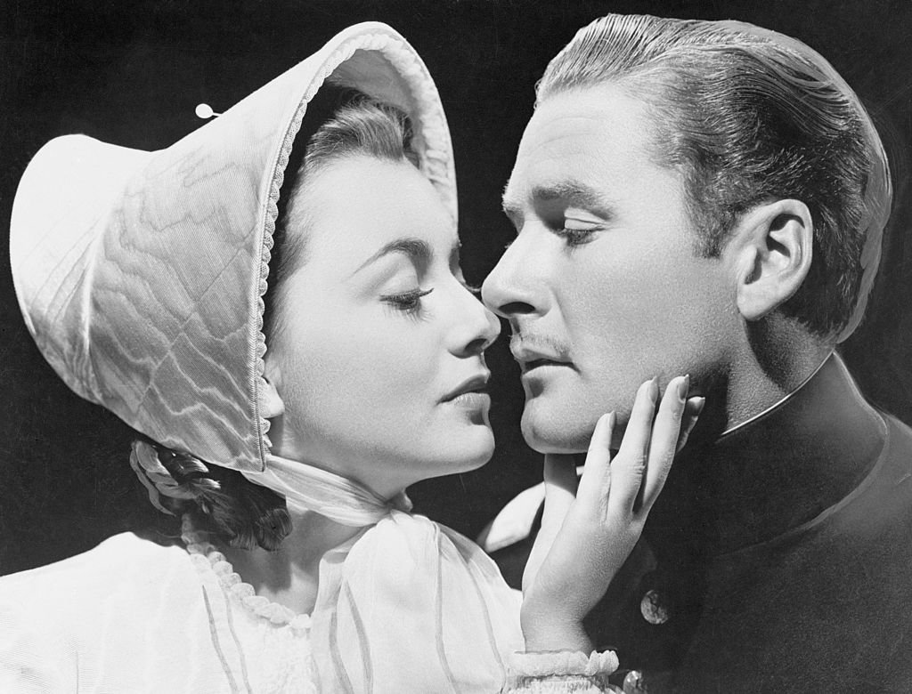 Olivia de Havilland and Errol Flynn on the set of "They Died with Their Boots On" in 1941. | Source: Warner Bros. Pictures/Sunset Boulevard/Corbis/Getty Images