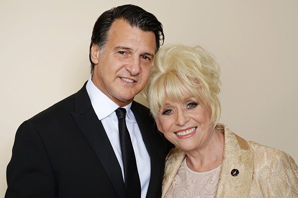 Barbara Windsor and Scott Mitchell at the Amy Winehouse Foundation Gala in London. | Photo: Getty Images.