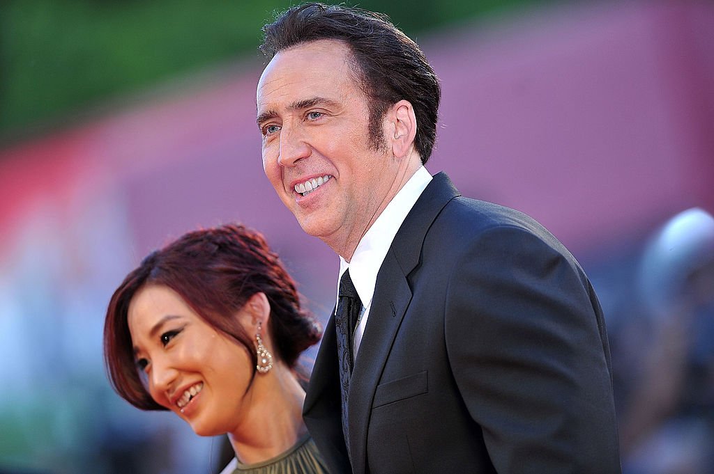 Actor Nicolas Cage and his ex-wife Alice Kim Cage attend the 'Joe' Premiere during The 70th Venice International Film Festival at Palazzo Del Cinema on August 30, 2013. | Photo: Getty Images