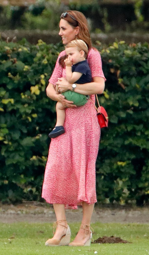 Kate Middleton and Prince Louis of Cambridge attend the King Power Royal Charity Polo Match on July 10, 2019, in Wokingham, England. | Source: Getty Images.