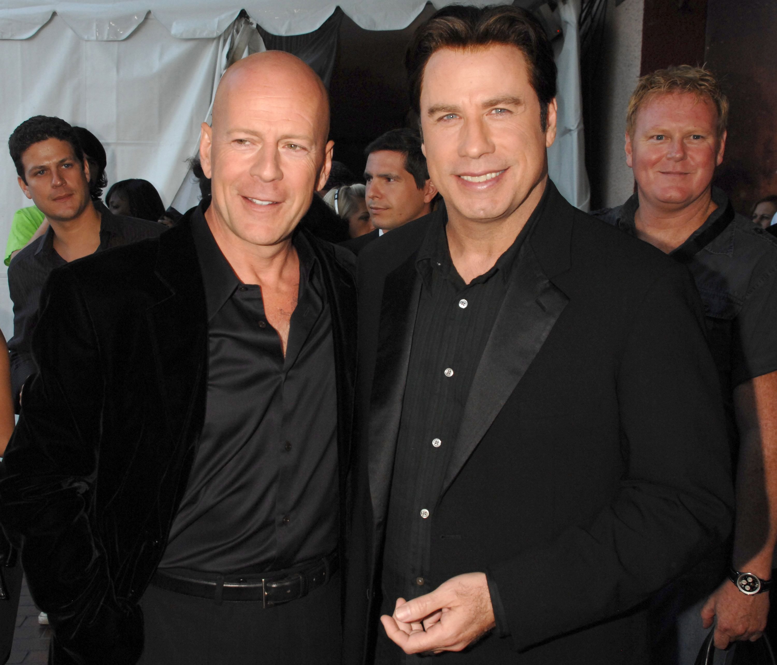 Bruce Willis and John Travolta at the 2007 MTV Movie Awards - Backstage and Audience at Gibson Amphitheater in Los Angeles, California | Photo: Jeff Kravitz/FilmMagic Inc via Getty Images