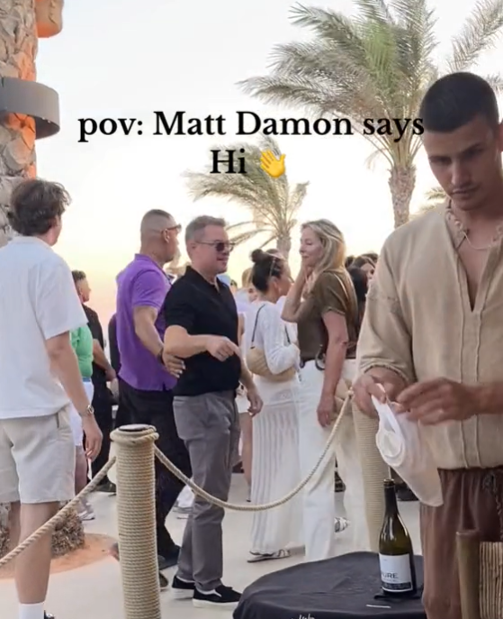 Matt Damon walks with friends in a crowded area along Scorpios Mykonos, posted in July 2024. | Source: Tiktok/queen_casablanca