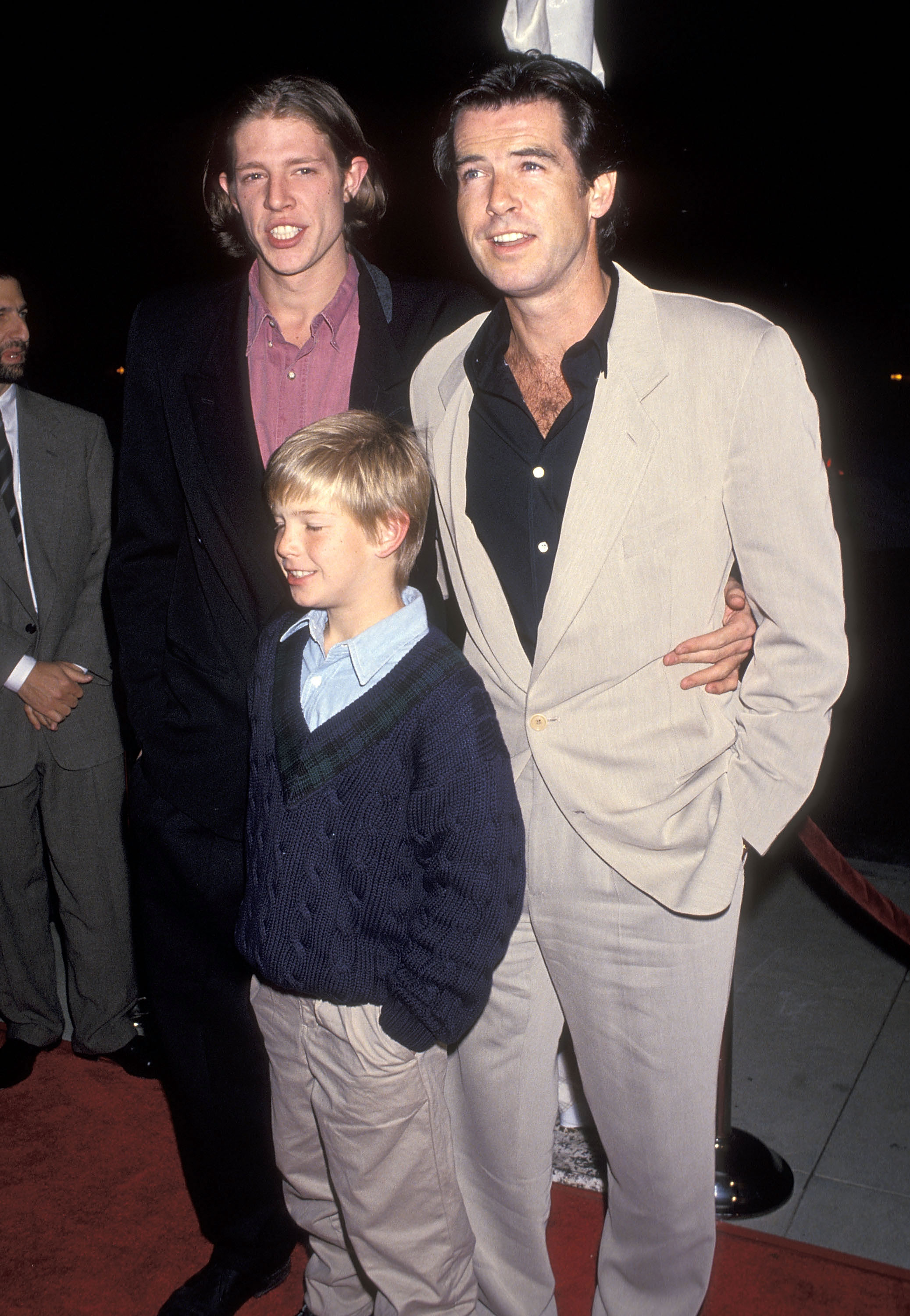 Pierce Brosnan, Christopher Brosnan, and Sean Brosnan attend the "Mrs. Doubtfire" premiere on November 22, 1993 in California | Source: Getty Images