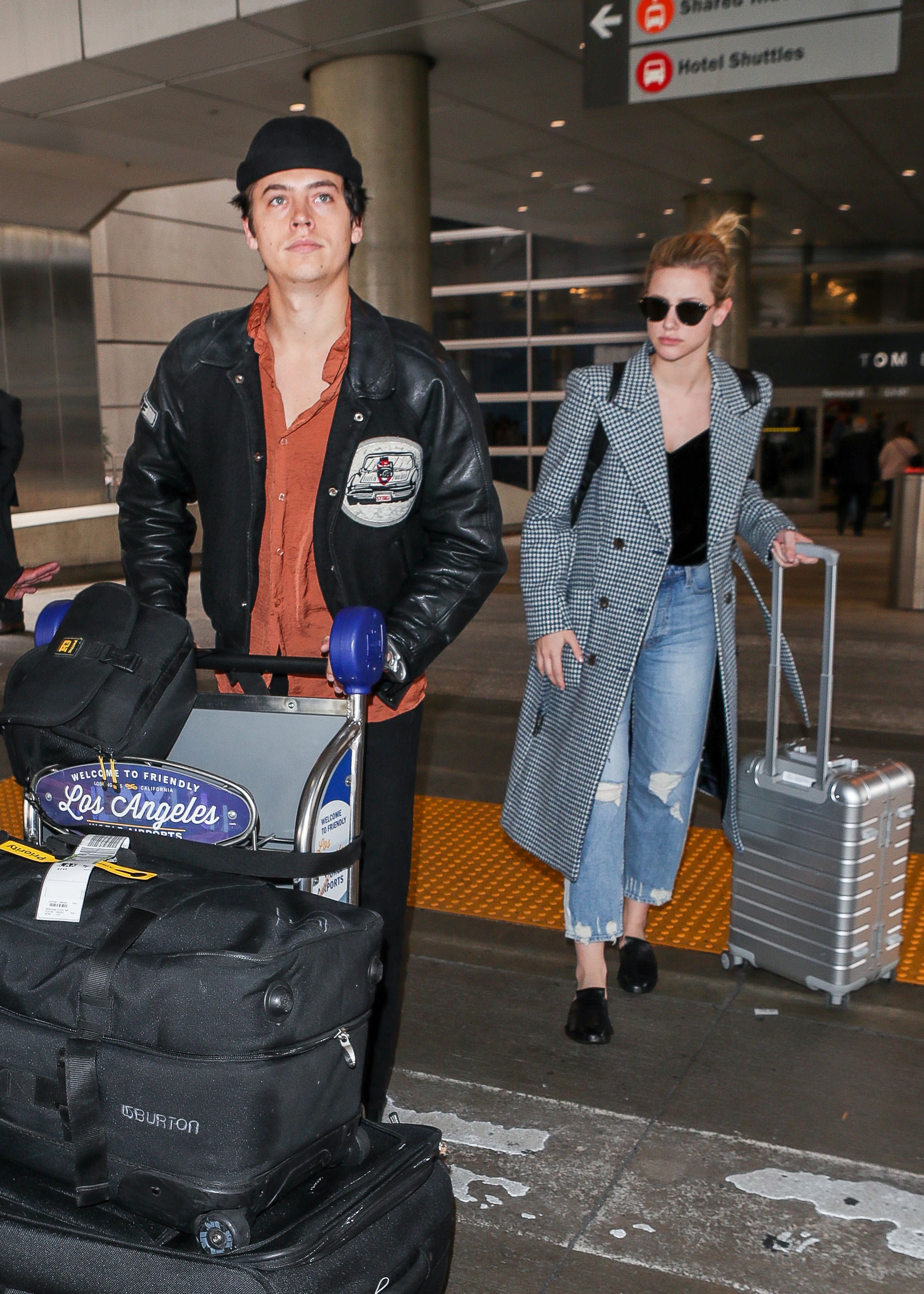 Lili Reinhart and Cole Sprouse at an airport on April 4, 2018, in Los Angeles, California. | Source: Getty Images
