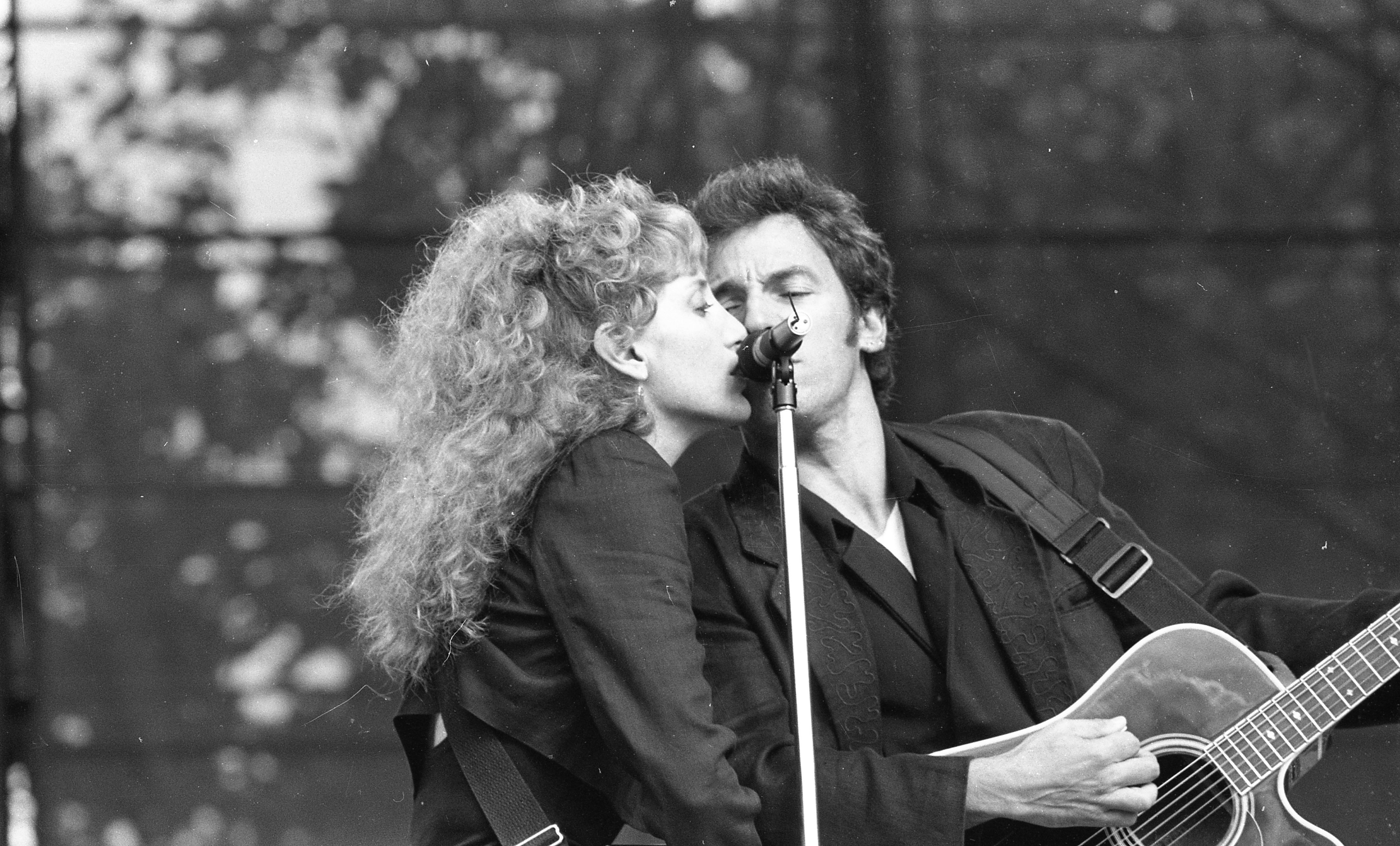 Bruce Springsteen and Patti Scialfa on stage in the RDS, on July 7 1988 | Source: Getty Images