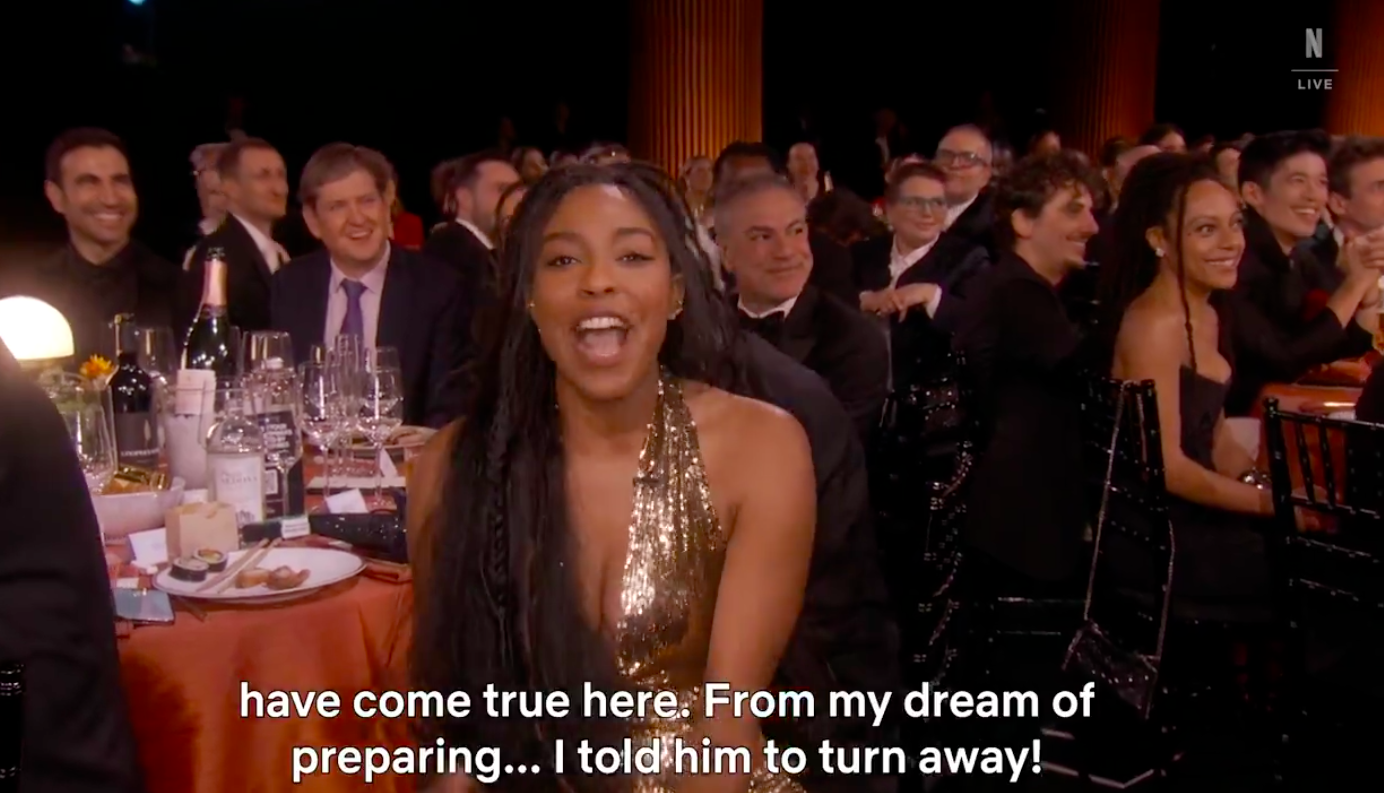 Jessica Williams yelling at Harrison Ford as the SAG Awards audience laughs. | Source: X/@netflix