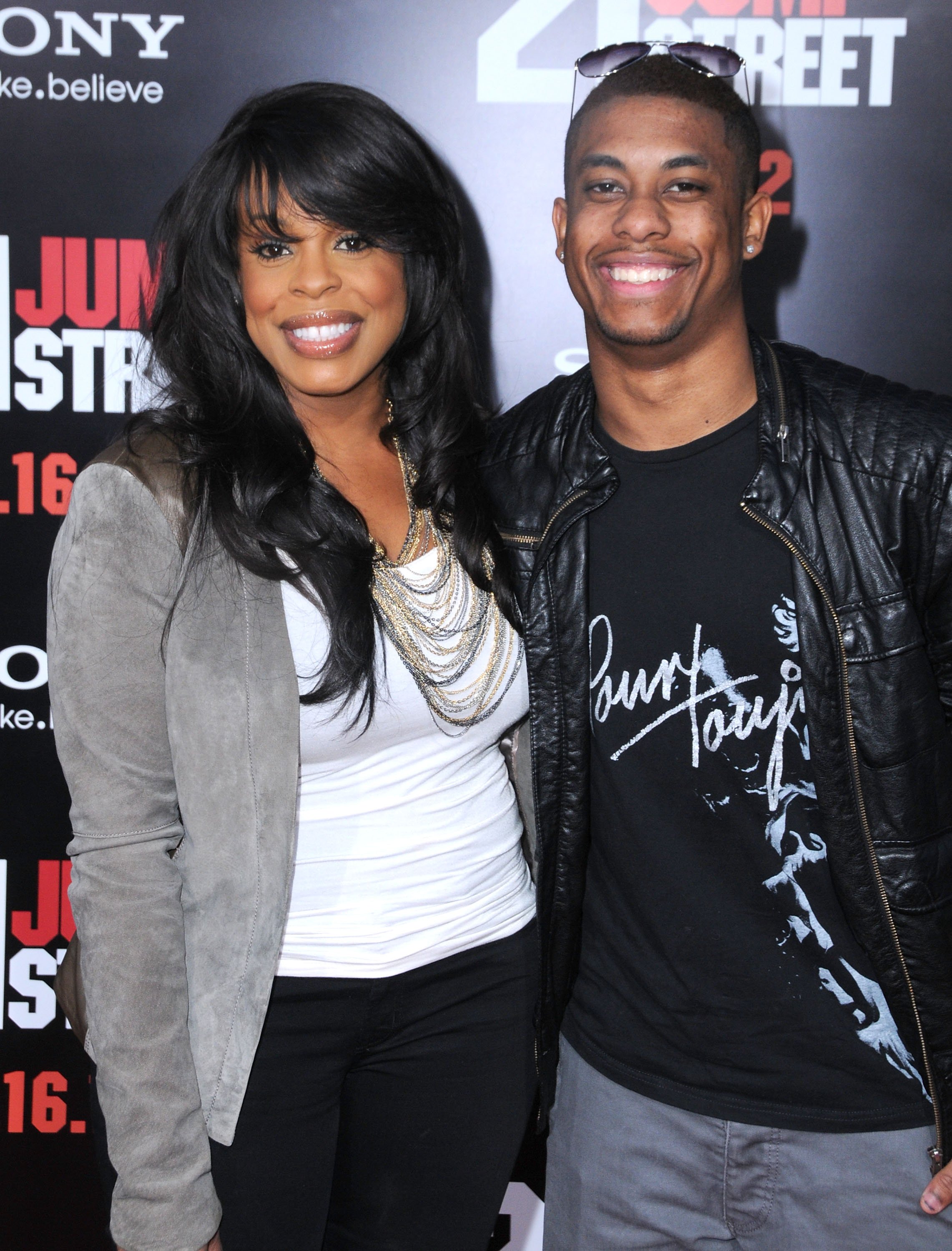 Niecy Nash and her son, Dominic Nash, pose as they arrive at the Los Angeles Premiere '21 Jumpstreet' at Grauman's Chinese Theatre on March 13, 2012, in Hollywood, California | Source: Getty Images