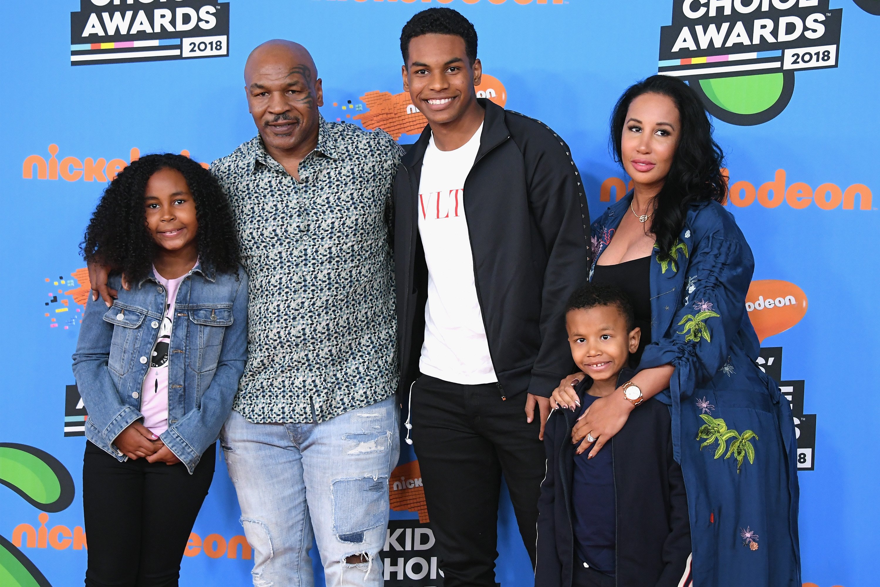 Mike Tyson with Lakiha Tyson and Milan Tyson, Miguel Tyson, and Morocco Tyson at The Forum on March 24, 2018, in Inglewood, California. | Source: Getty Images