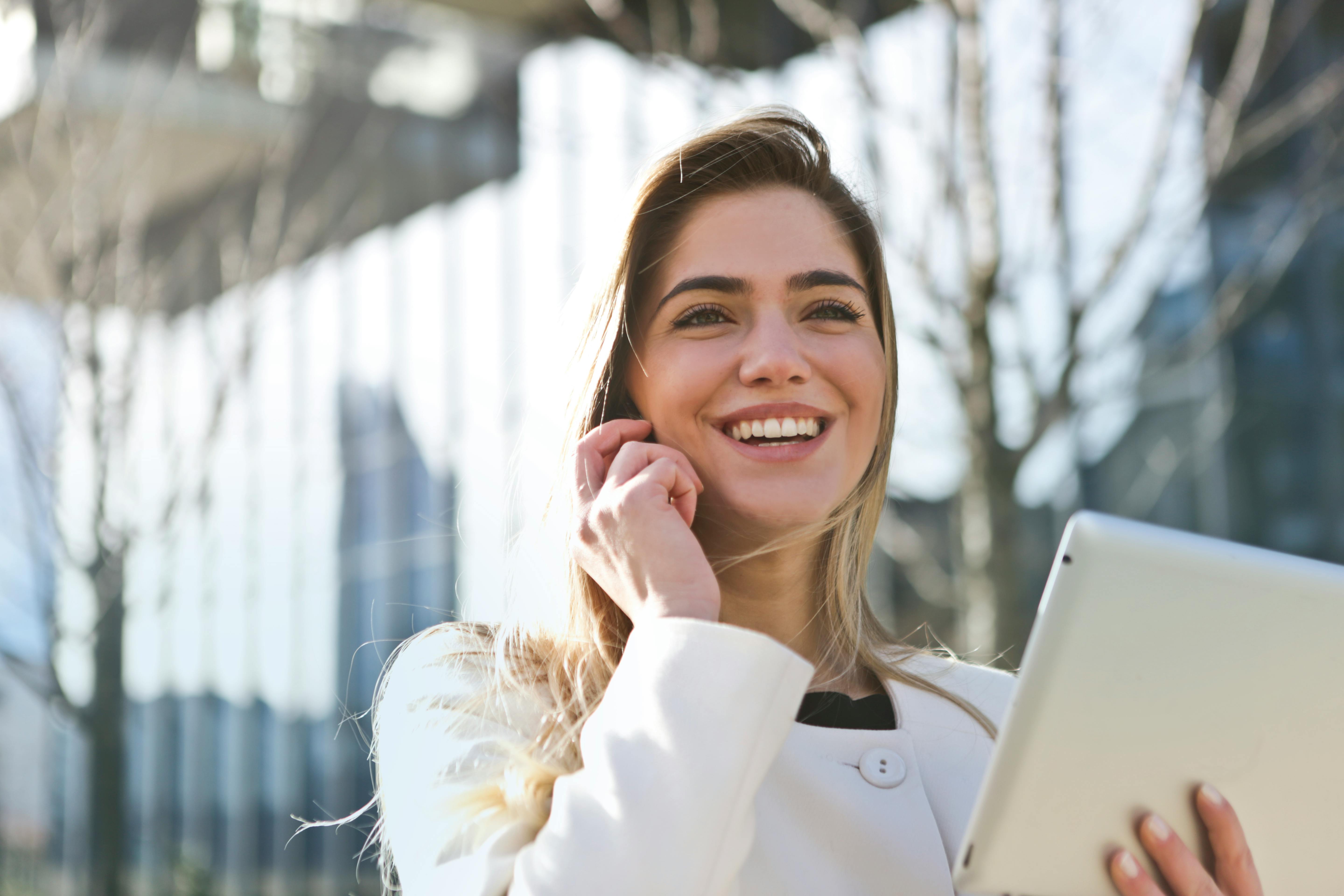 A happy woman on a phone call | Source: Pexels