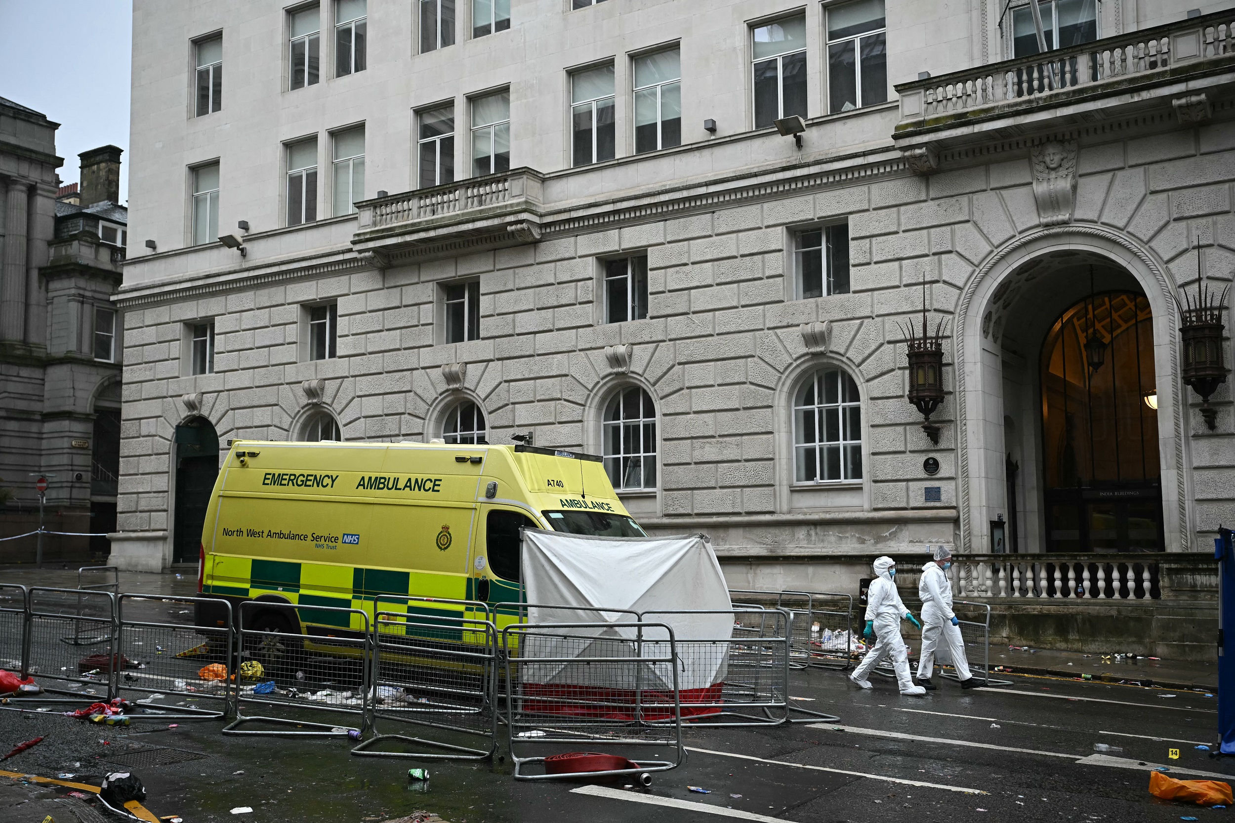 Police forensics officers work the scene on Water Street in Liverpool, England, on May 27, 2025, after a car plowed into crowds gathered for Liverpool's Premier League trophy parade on May 26 | Source: Getty Images