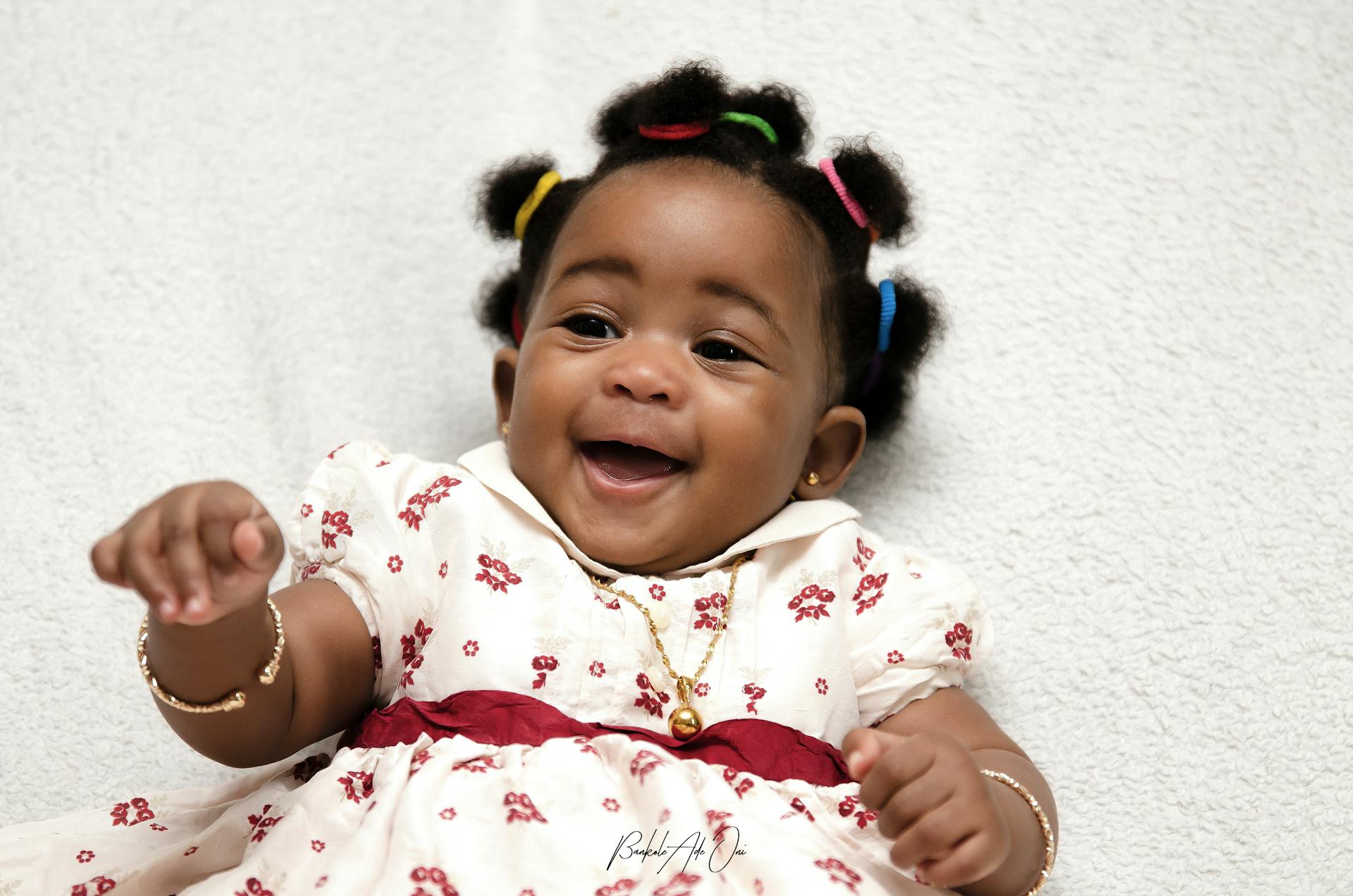 A happy baby girl | Source: Pexels