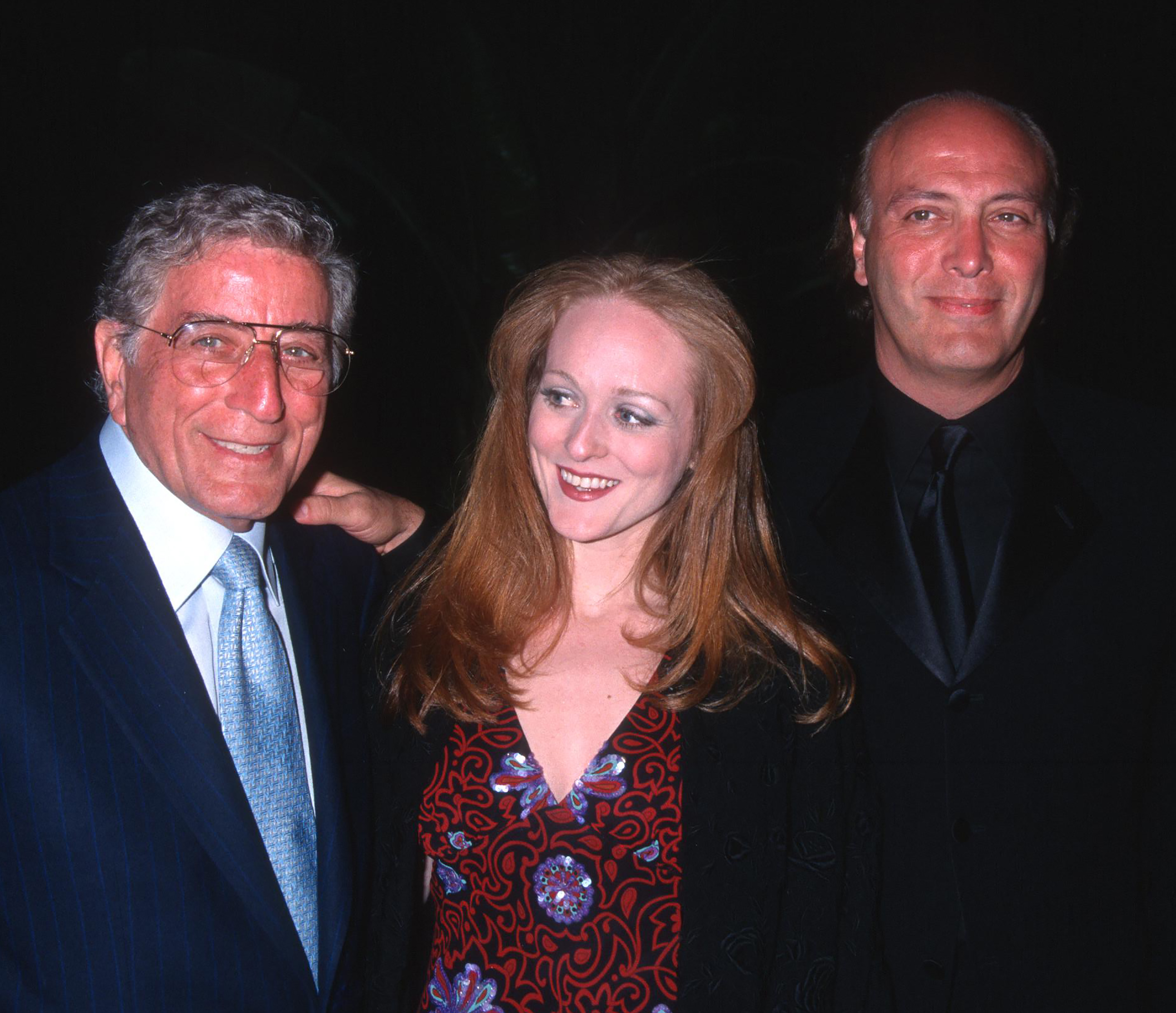 Tony, Antonia, and Danny Bennett at the Clive Davis pre-Grammy party in Beverly Hills, 2002 | Source: Getty Images