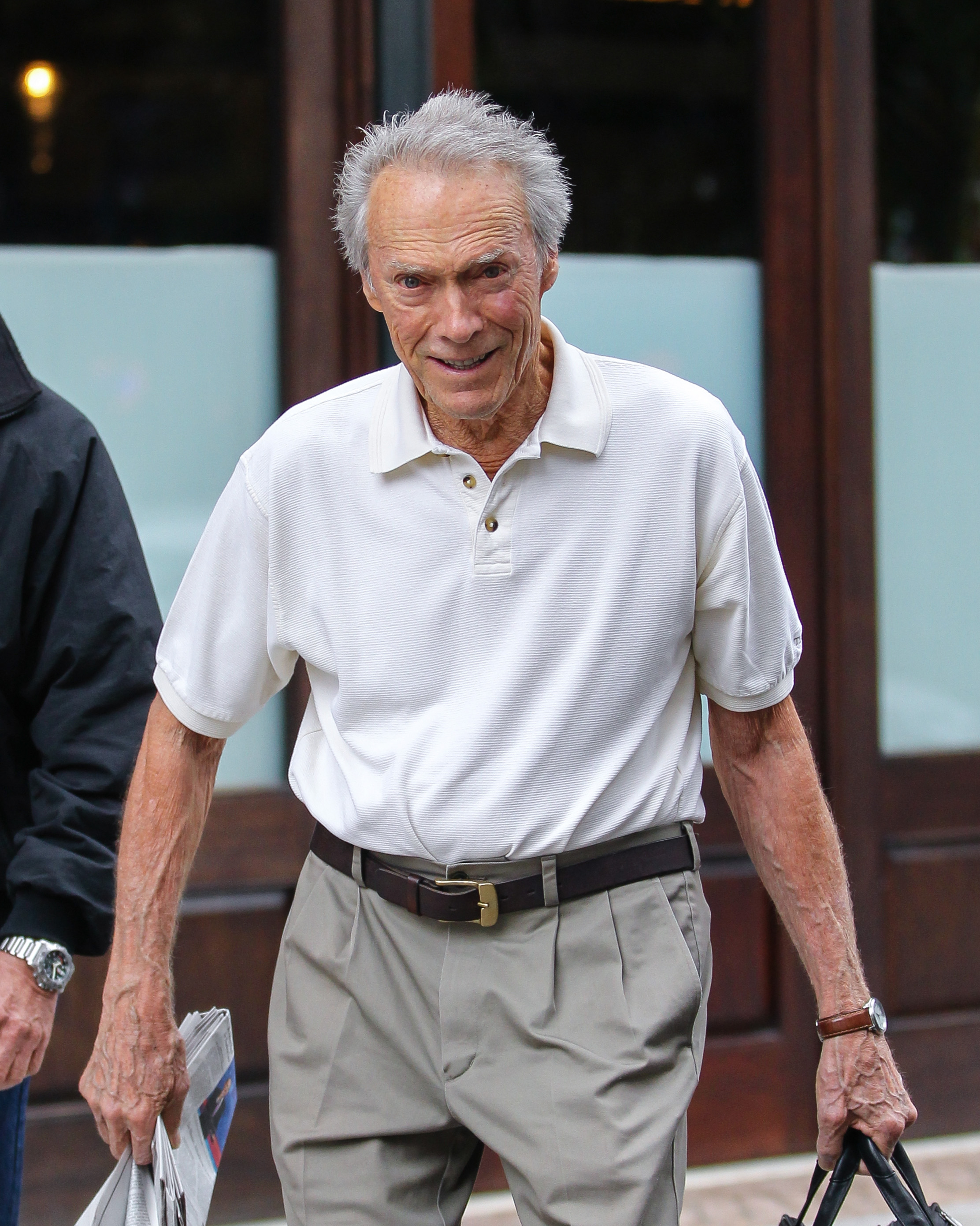 Clint Eastwood leaving Greenwich Hotel in New York City on October 16, 2013 | Source: Getty Images