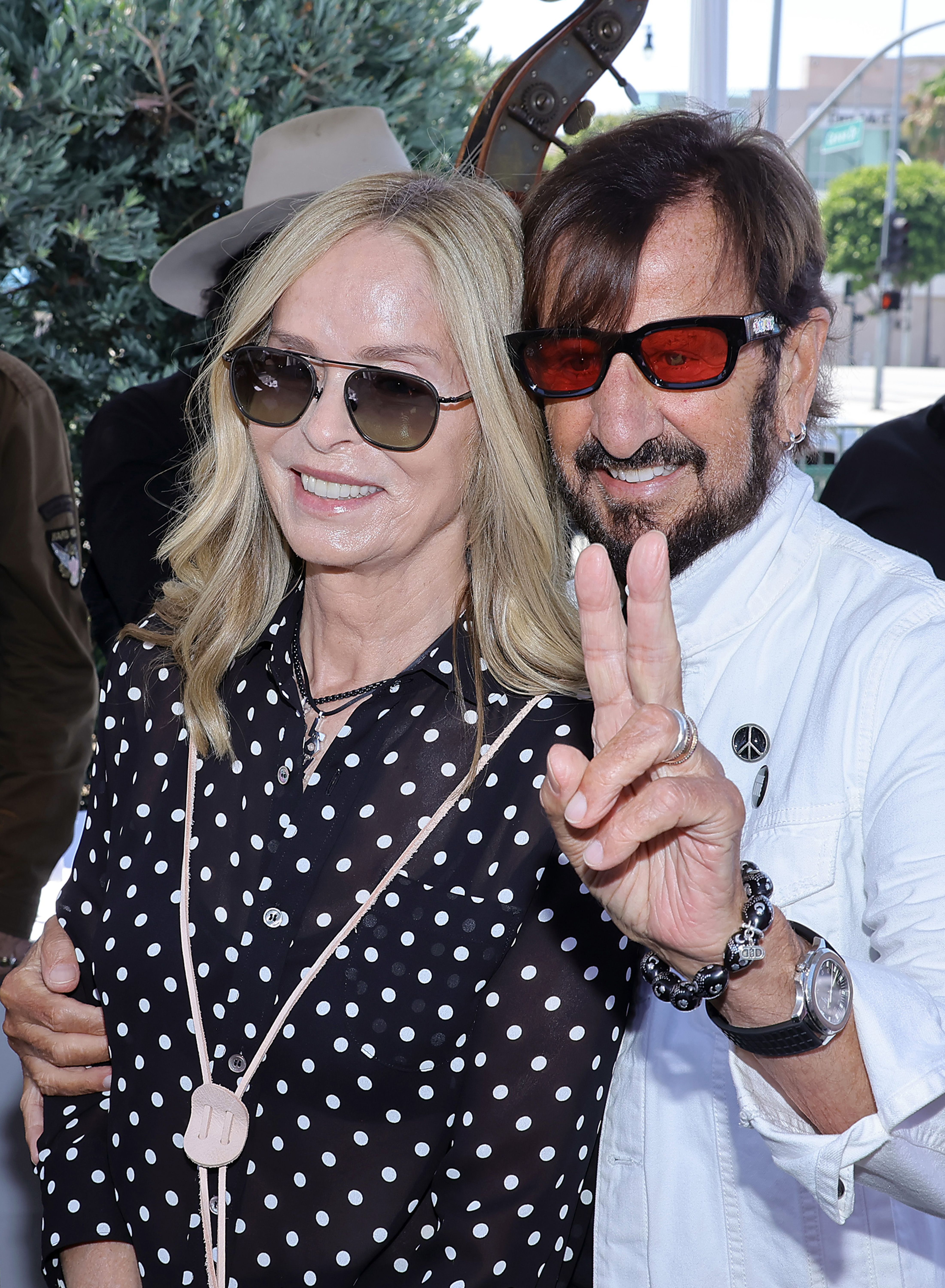 Barbara Bach and Ringo Starr at his Peace & Love Birthday Celebration on July 7, 2024, in Beverly Hills, California | Source: Getty Images