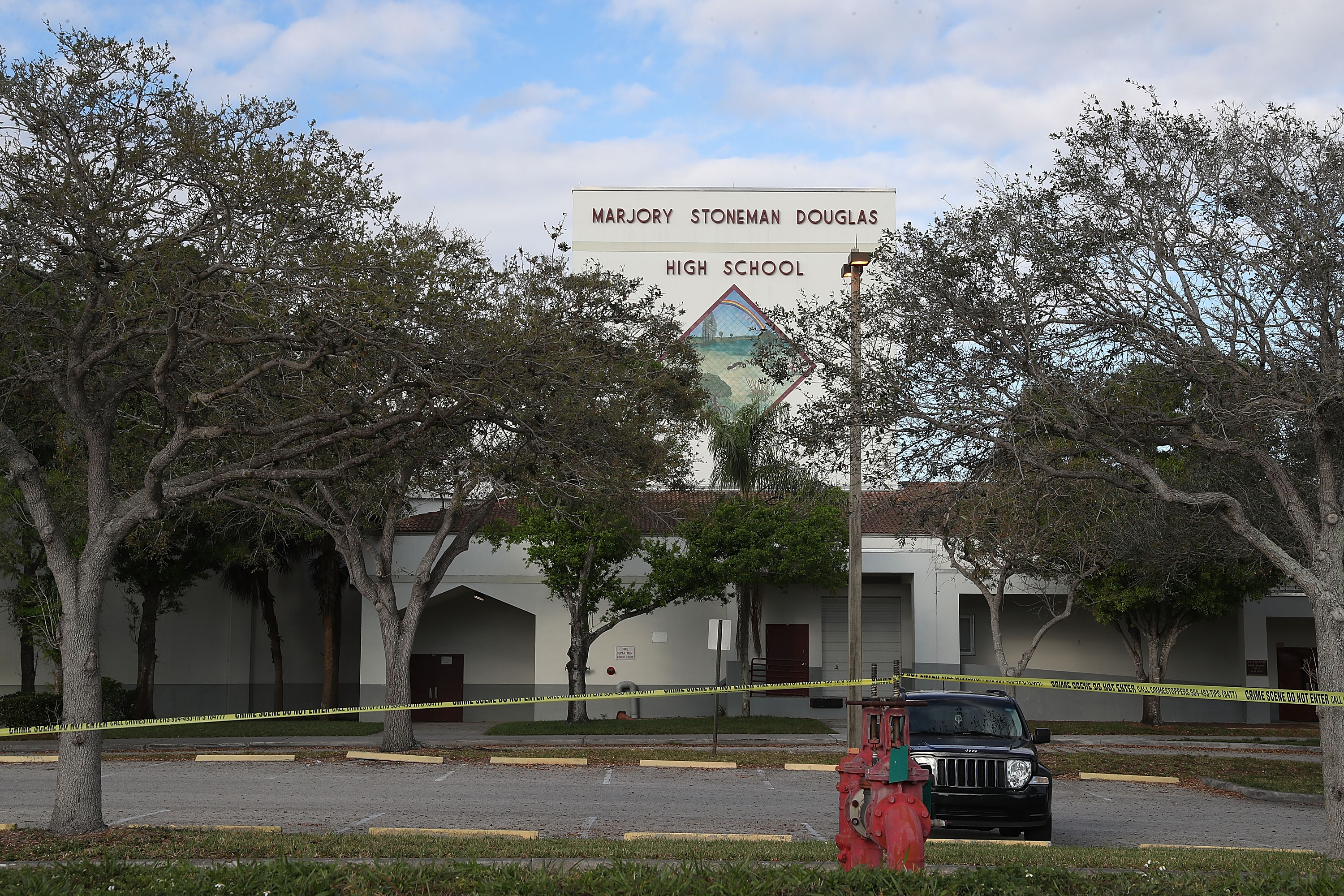 The front entrance of Marjory Stoneman Douglas High School is seen days after the 2018 mass shooting in Parkland, Florida | Source: Getty Images
