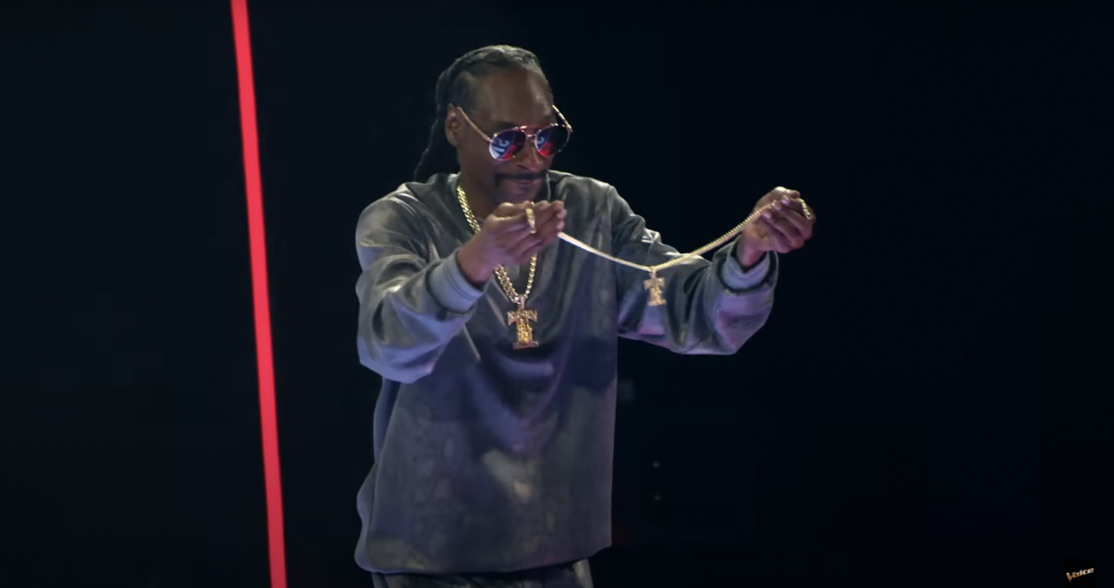 Snoop Dogg holding up the Death Row Records chain on season 26 of "The Voice." | Source: YouTube/The Voice