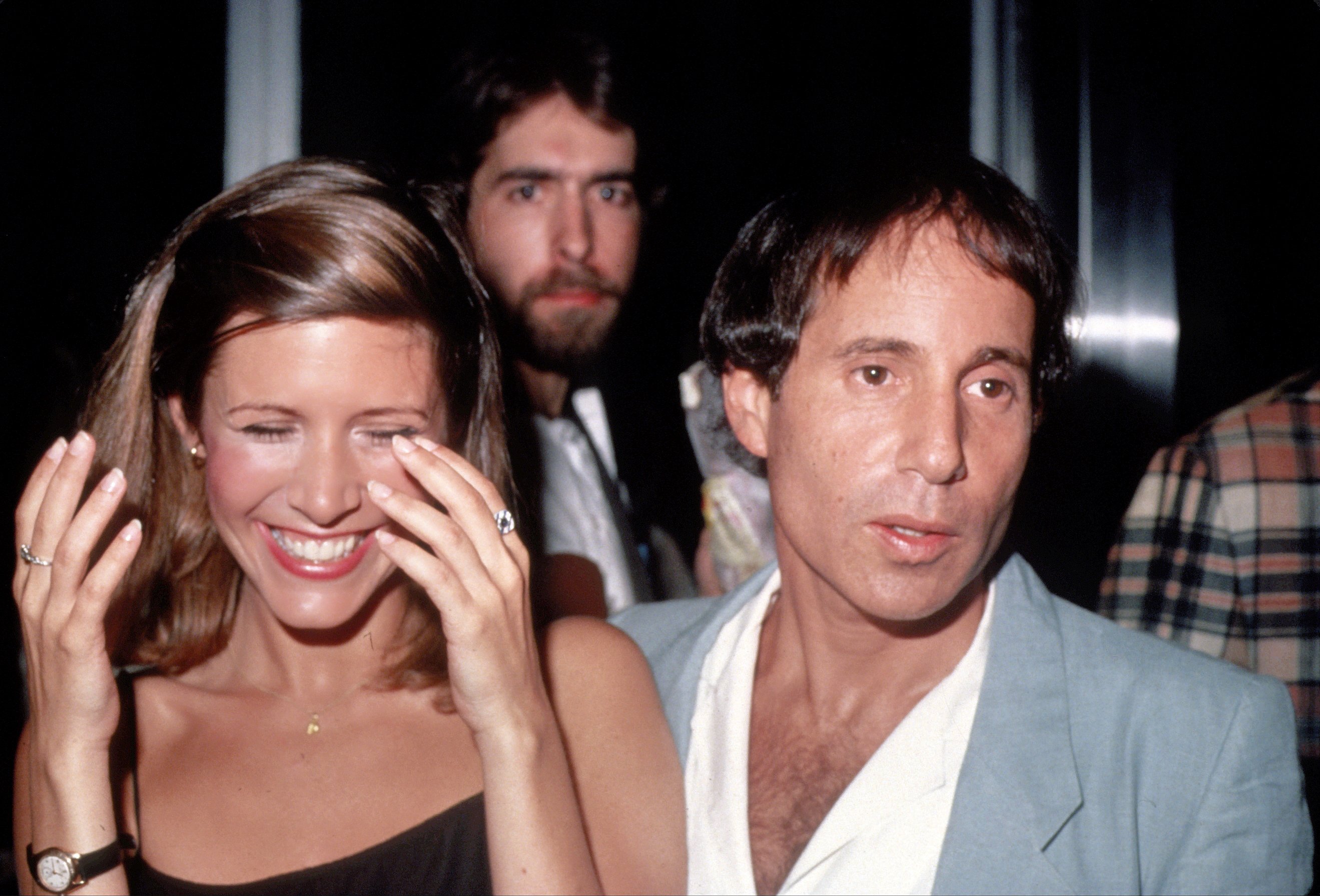 Carrie Fisher and Paul Simon at circa 1983 in New York City. | Source: Getty Images 