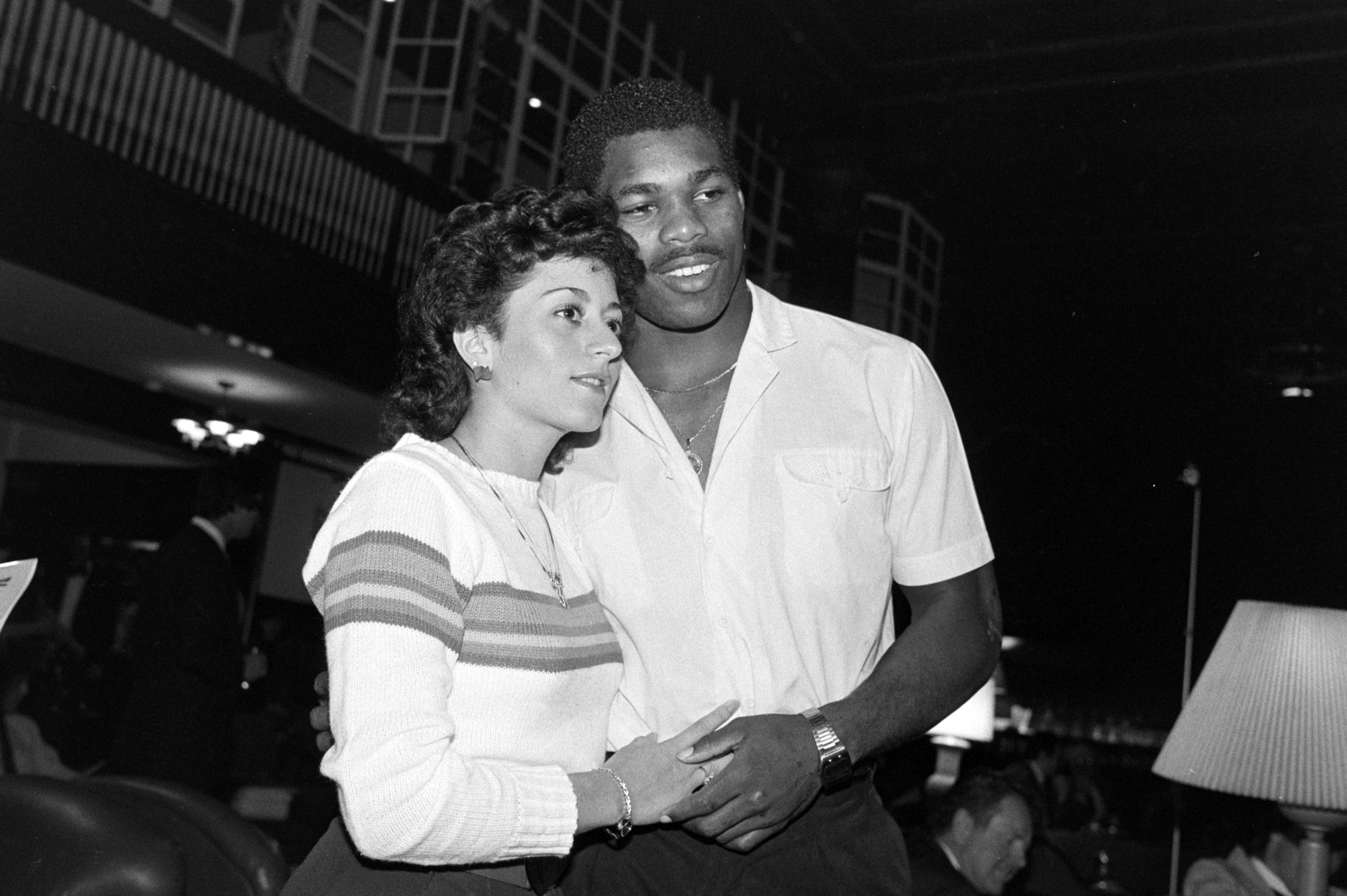 Cindy DeAngelis Grossman and Herschel Walker and at Franklin Sports Industries conference on April 5, 1983 | Source: Getty Images