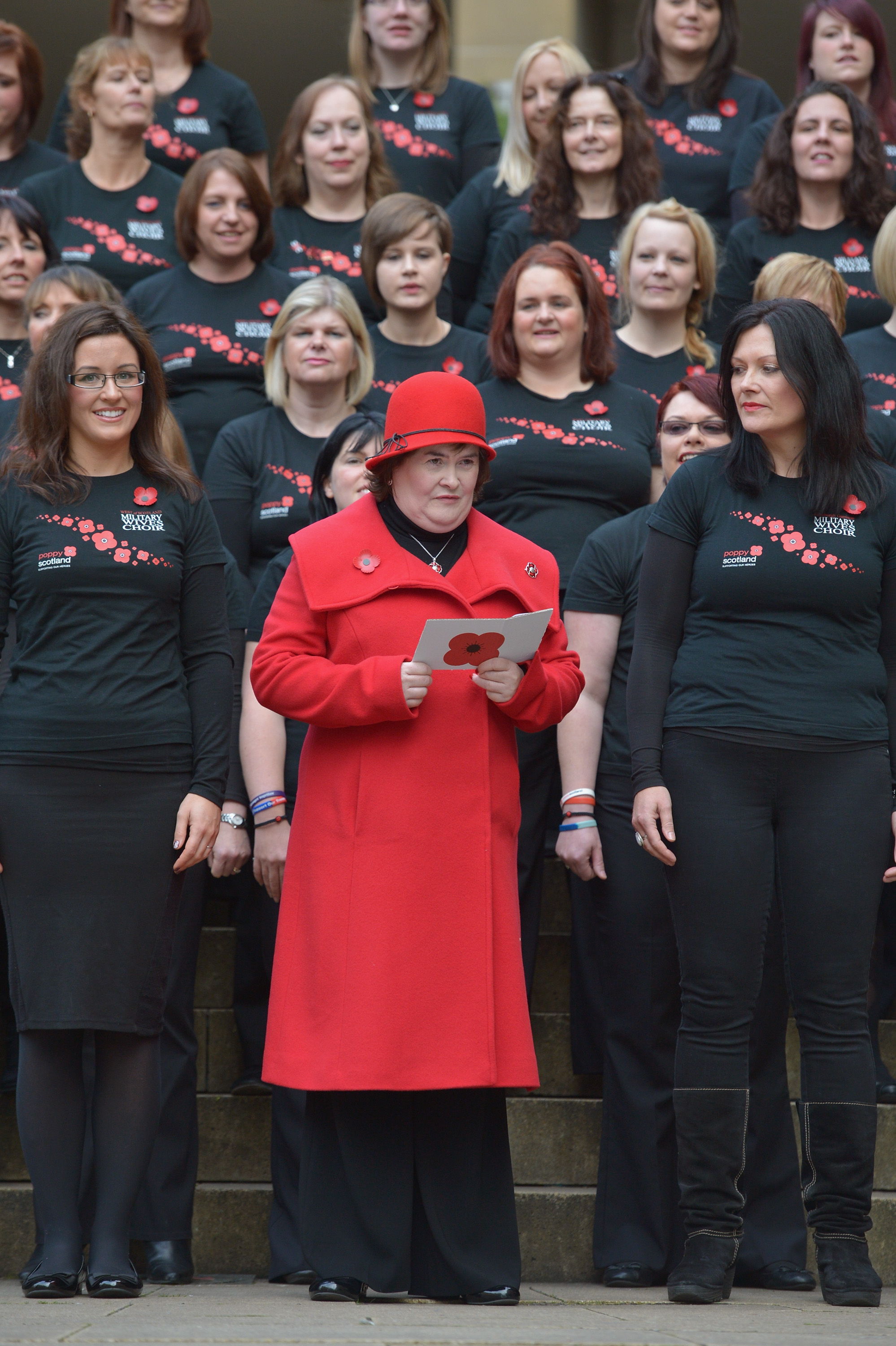Susan Boyle and the Scottish Military Wives choir launch the Poppy Scotland appeal on October 24, 2012 in Glasgow, Scotland | Source: Getty Images