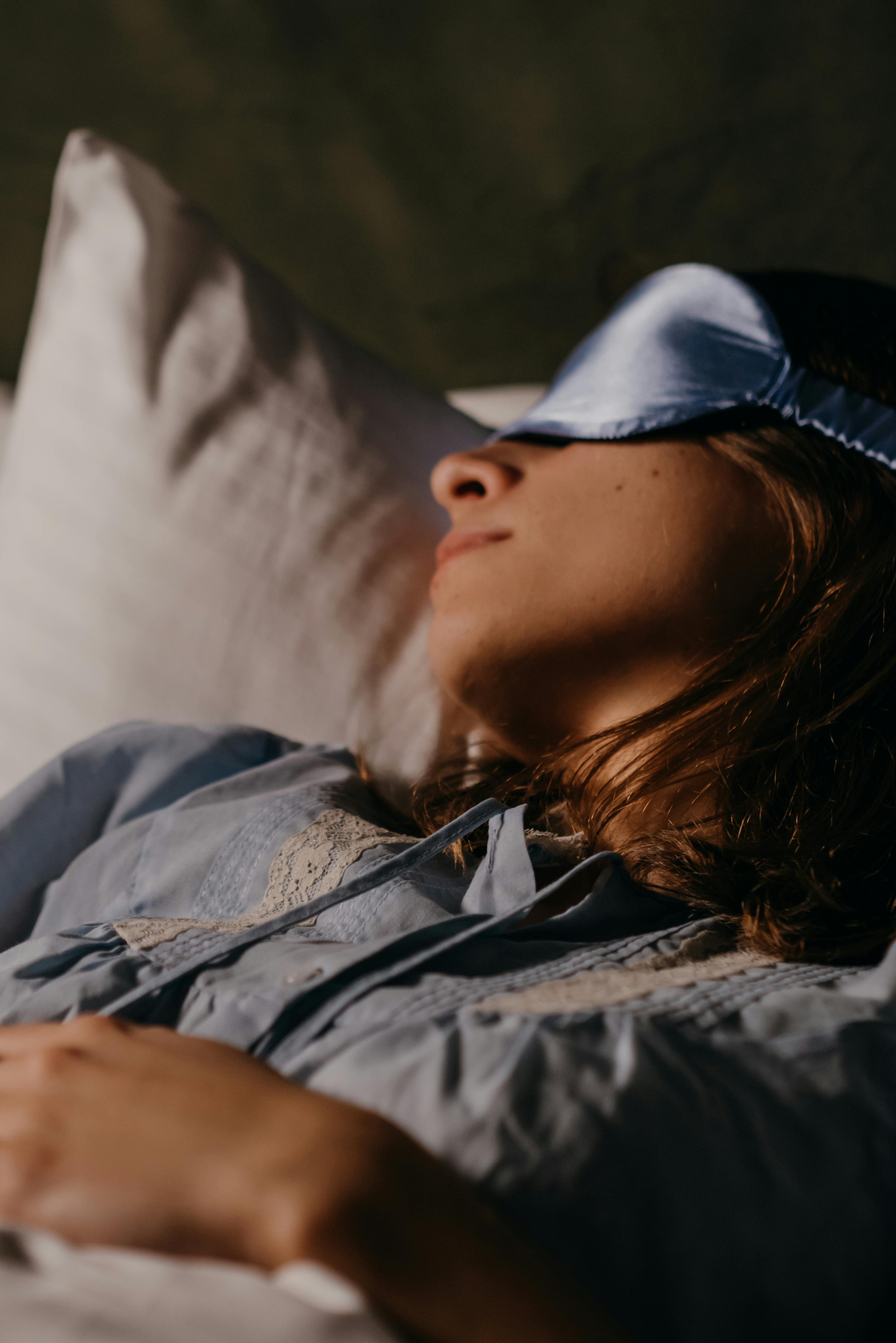A woman sleeping in a warm room | Source: Pexels
