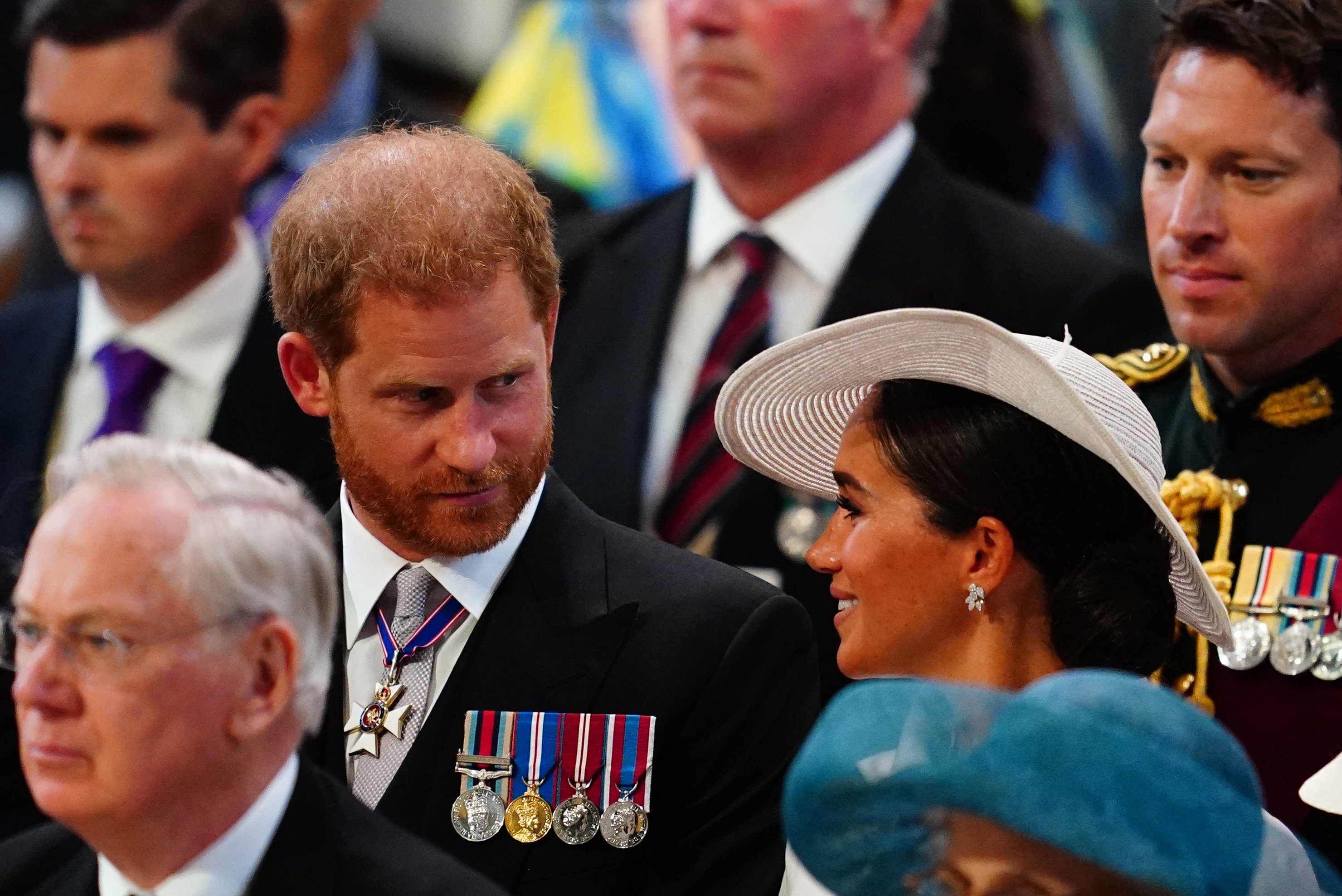 Prince Harry and Duchess Meghan at the National Service of Thanksgiving to celebrate the Platinum Jubilee of the Queen at St Paul's Cathedral on June 3, 2022, in London, England. | Source: Getty Images