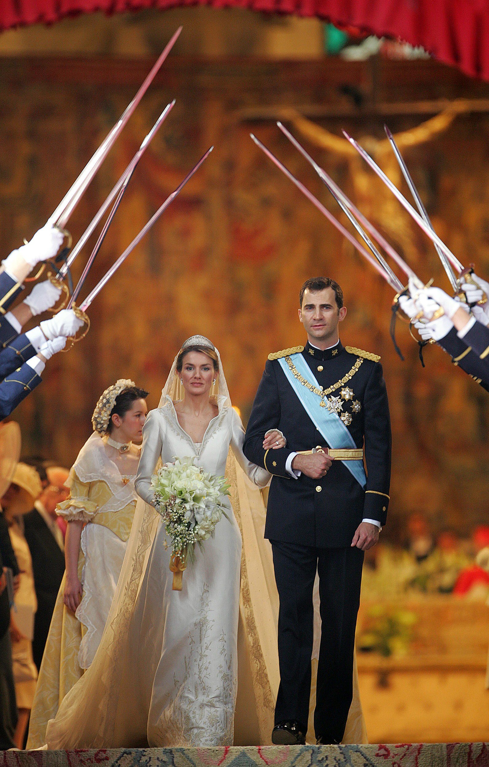 Letizia Ortiz and Spanish Crown Prince Felipe pictured as newlyweds at Madrid's Almudena Cathedral at the end of their wedding ceremony on May 22, 2004. / Source: Getty Images