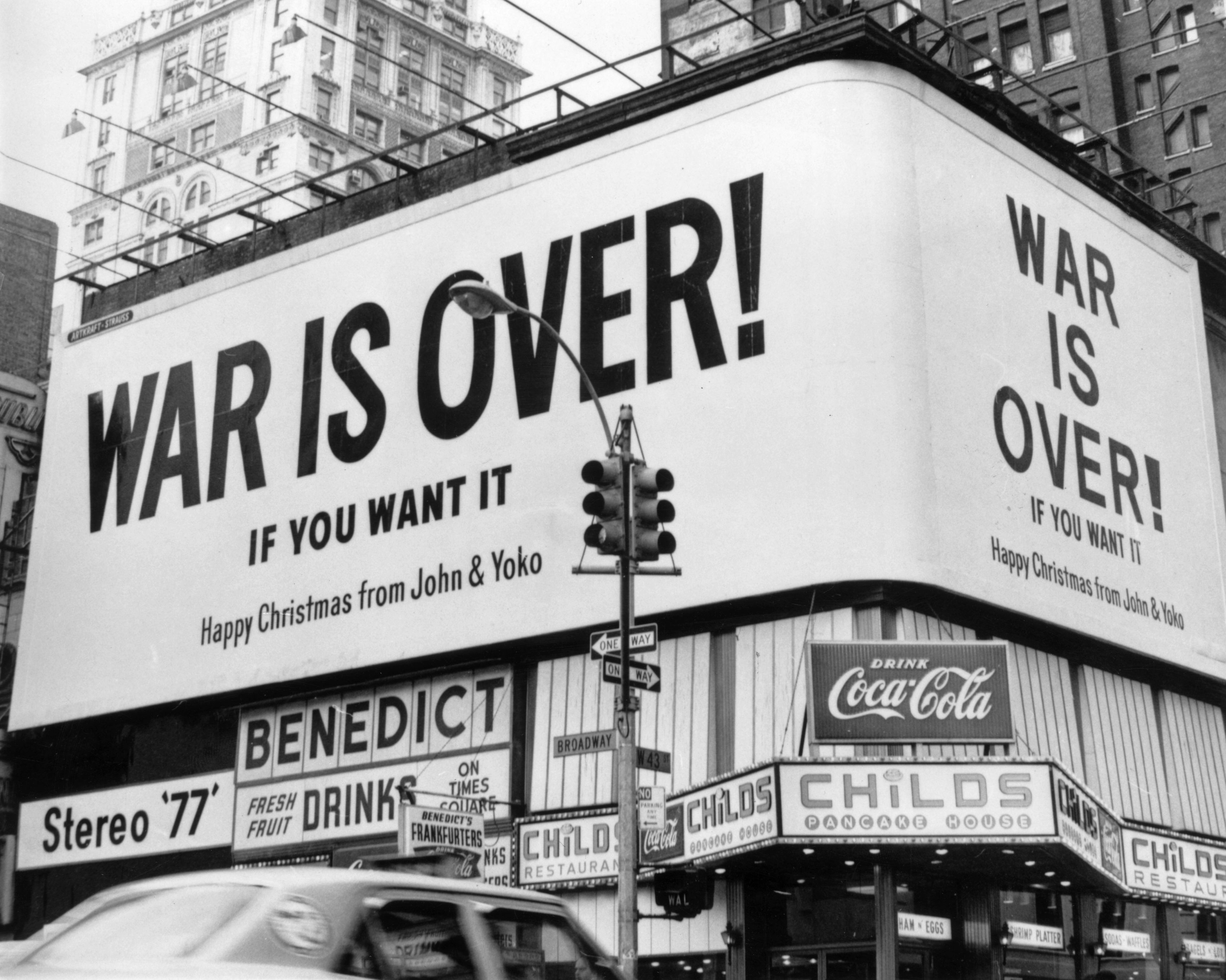 A large Christmas peace message reading "War is Over!" from John Lennon and Yoko Ono on a billboard in 1971. | Source: Getty Images