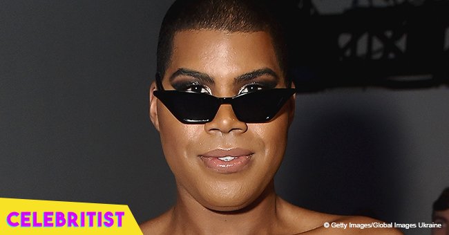 EJ Johnson steals the show in strapless black mini dress & leather boots in red carpet appearance