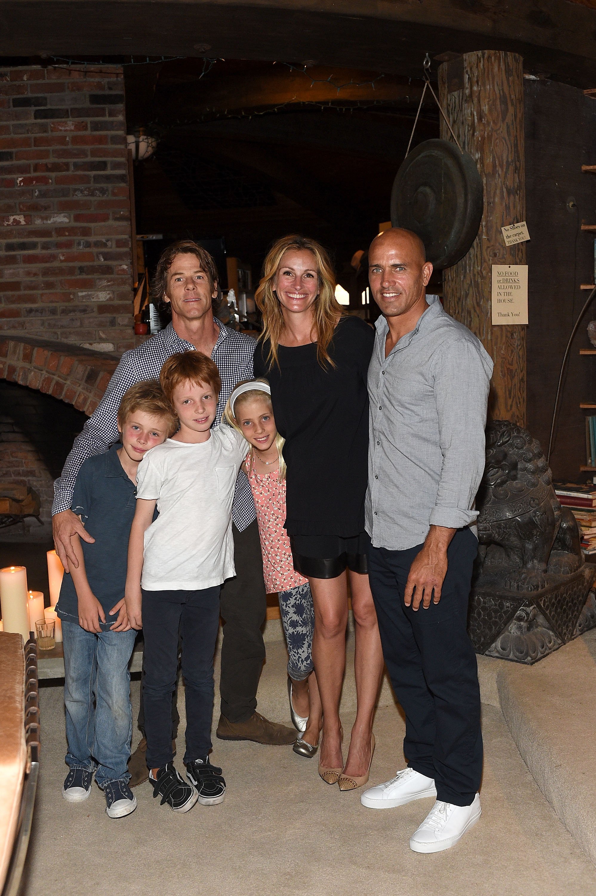  Daniel Moder, Julia Roberts, Kelly Slater, Phinnaeus Moder, Henry Daniel Moder and Hazel Moder attend Kelly Slater, John Moore and Friends Celebrate the Launch of Outerknown at Private Residence on August 29, 2015 in Malibu, California. | Source: Getty Images