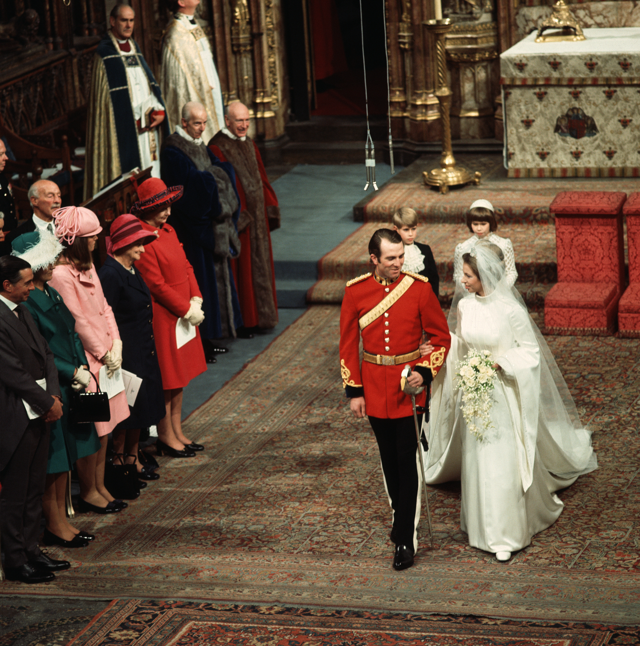 Mark Phillips and Princess Anne walk down the aisle together at Westminster Cathedral on November 14, 1973 in London, England. | Source: Getty Images