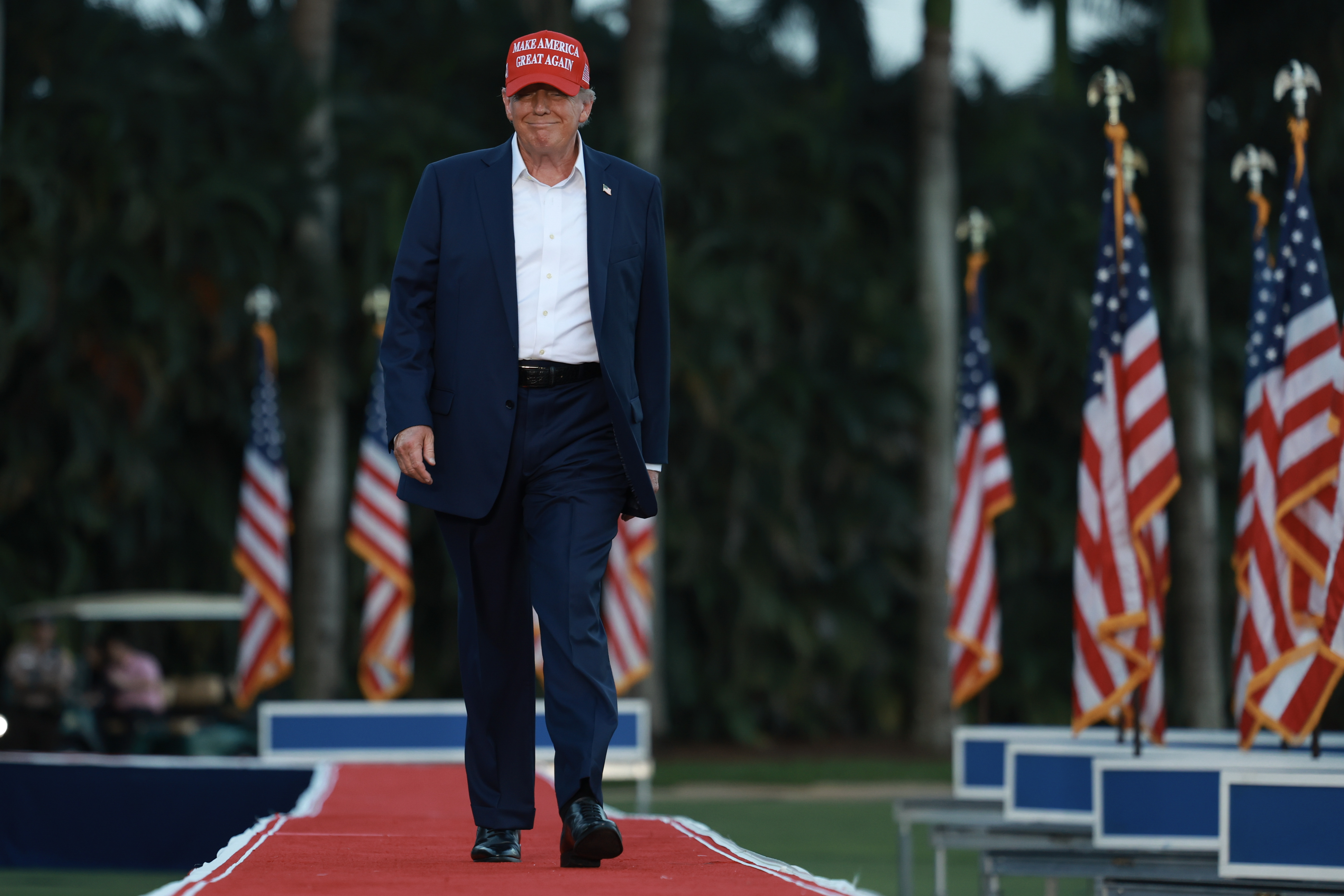 Donald Trump arrives for his campaign rally at the Trump National Doral Golf Club in Doral, Florida, on July 9, 2024 | Source: Getty Images