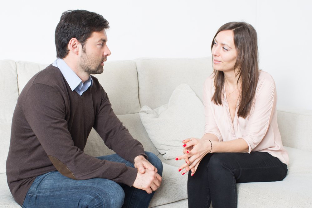 A photo of a man and a woman talking | Photo: Shutterstock