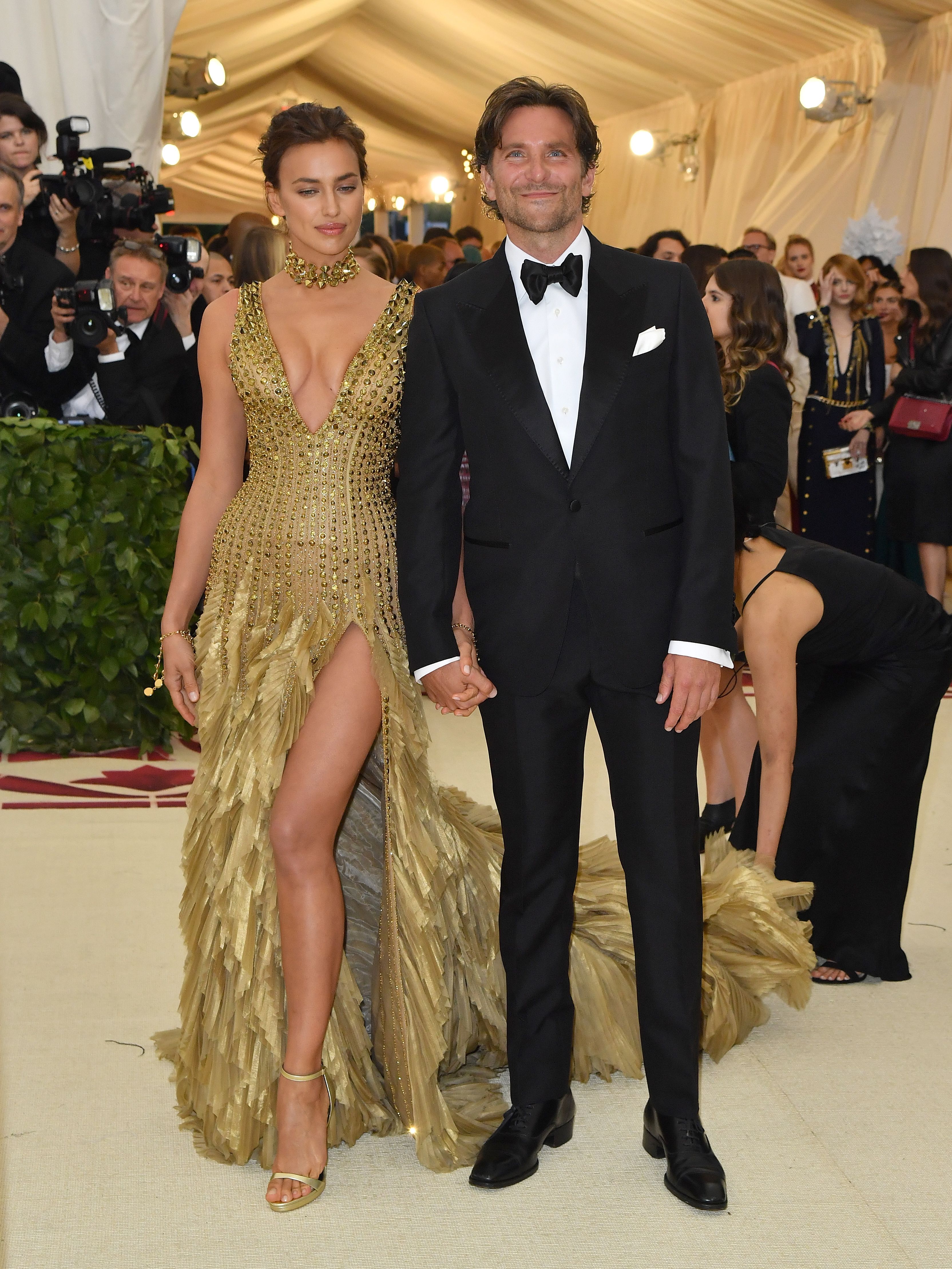 Irina Shayk and Bradley Cooper arrive for the 2018 Met Gala on May 7, 2018, at the Metropolitan Museum of Art in New York. - The Gala raises money for the Metropolitan Museum of Arts Costume Institute | Source: Getty Images