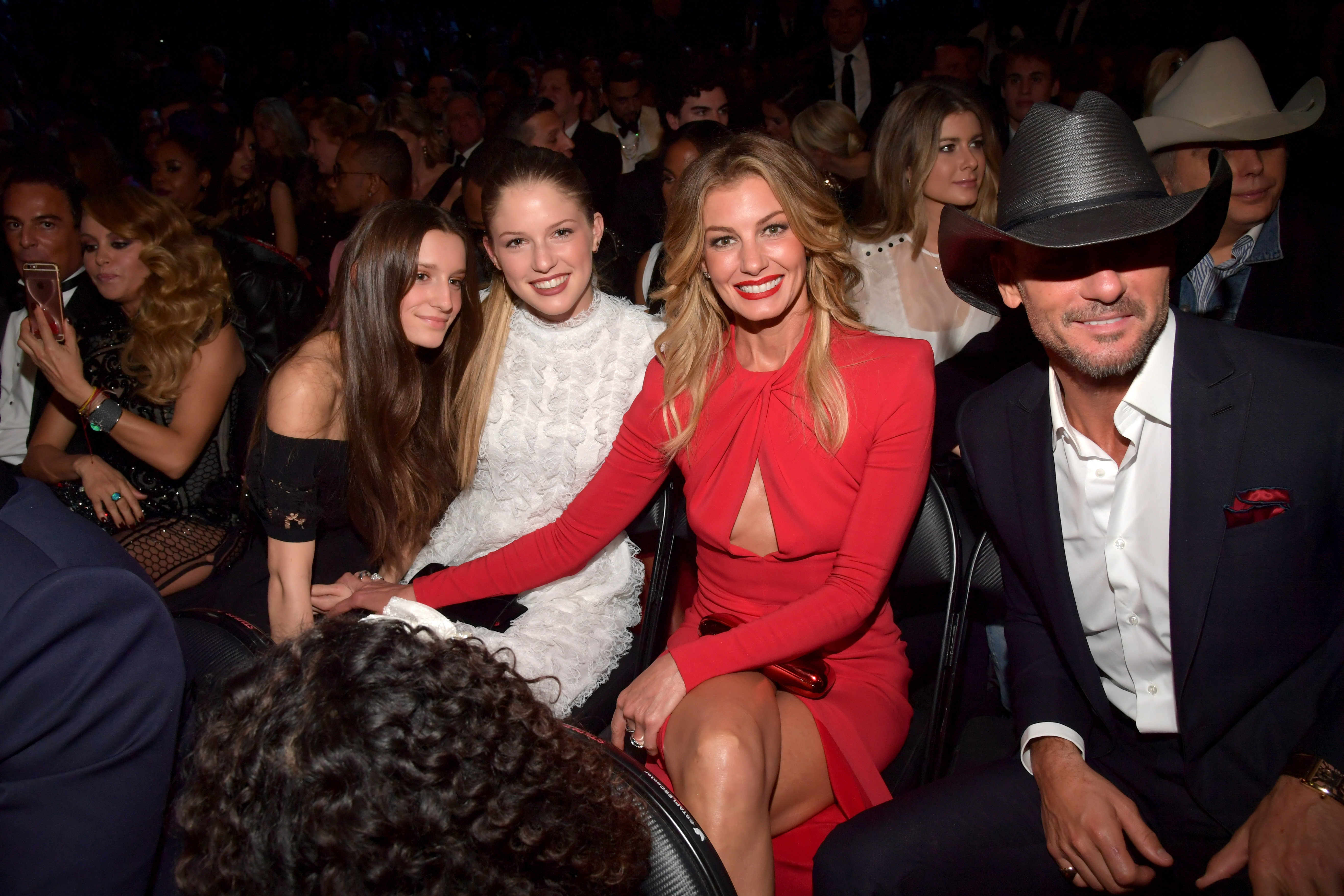 Faith Hill and Tim McGraw with daughters Audrey McGraw (L) and Maggie McGraw (C) attend The 59th GRAMMY Awards at STAPLES Center on February 12, 2017 in Los Angeles, California | Source: Getty Images