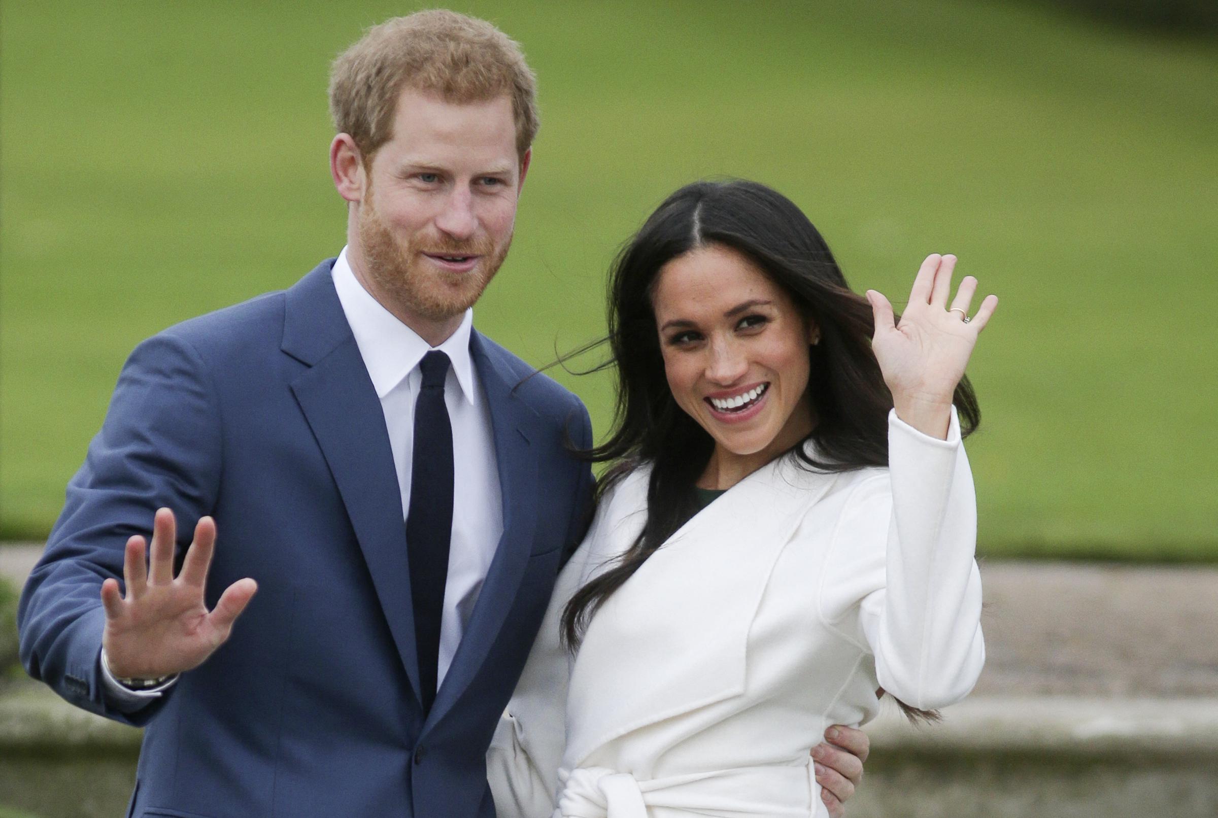 Prince Harry and Meghan Markle pose for a photograph in the Sunken Garden on November 27, 2017, in London, England. | Source: Getty Images