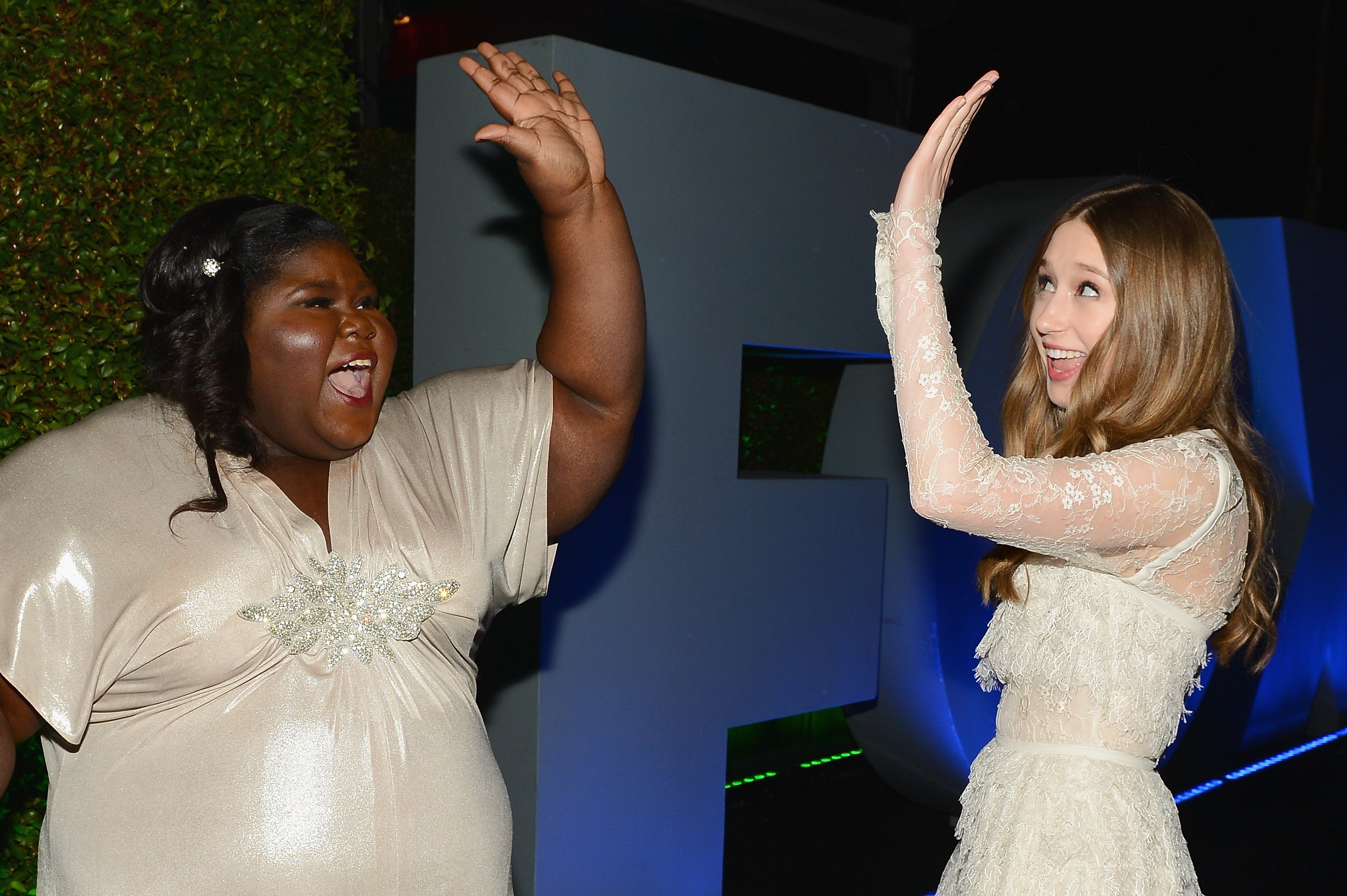 Actresses Gabourey Sidibe and Taissa Farmiga attend the Fox And FX's 2014 Golden Globe Awards Party in Beverly Hills, California on January 12, 2014 | Photo: Getty Images