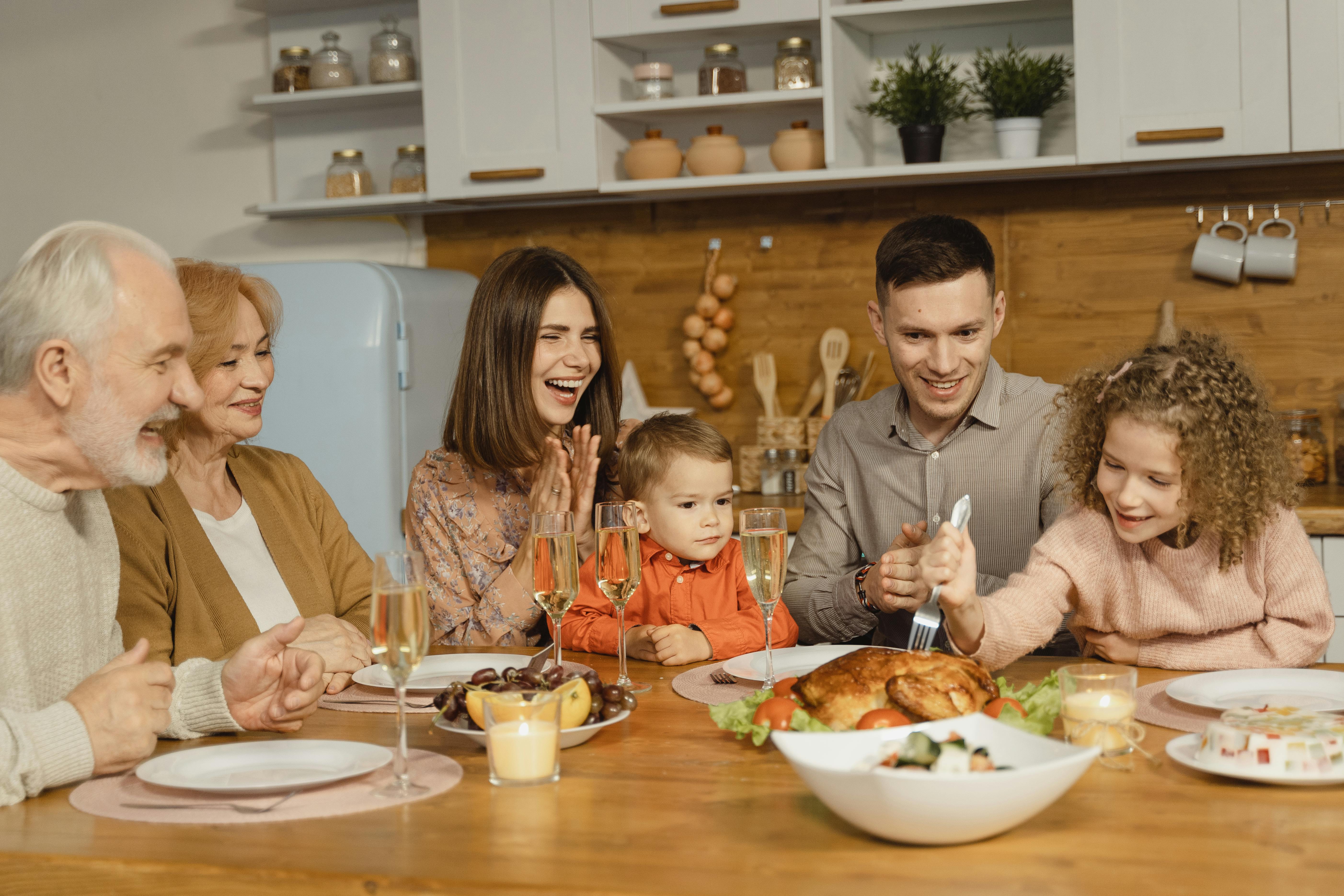 A family enjoying their meal together | Source: Pexels