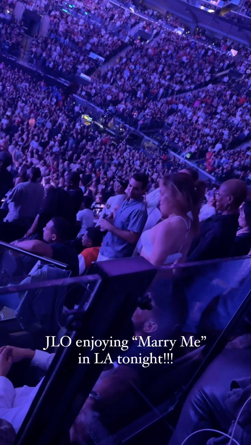 Jennifer Lopez closes her eyes as she listens to "Marry You" at Bruno Mars's concert in Los Angeles, California, in August 2024 | Source: Instagram/itstetrisbish