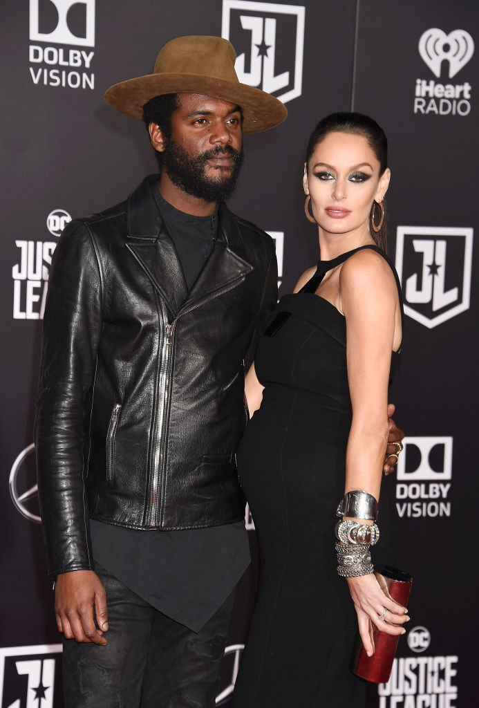  Musician Gary Clark Jr. (L) and wife/model Nicole Trunfio arrive at the premiere of Warner Bros. Pictures' 'Justice League' at the Dolby Theatre on November 13, 2017 | Photo: Getty Images