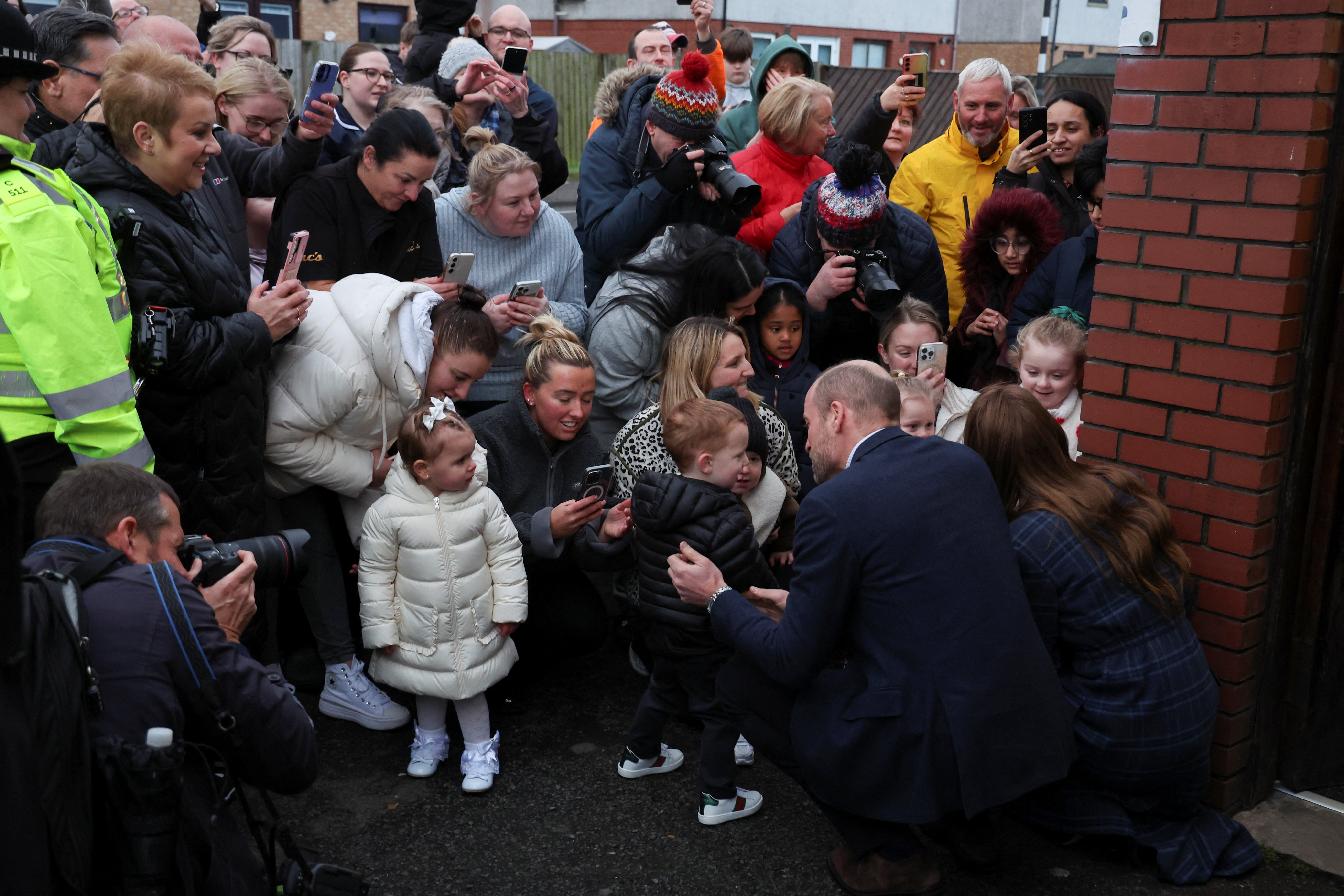 Prince William and Princess Catherine greet children as they visit The Gothenburg, known locally as "The Goth," on 20 January 2026 in Stirling, Scotland. | Source: Getty Images