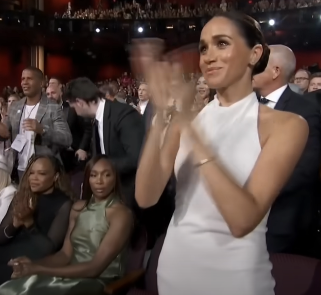 Venus Williams gazes sideways as Meghan Markle applauds Prince Harry at the 2024 ESPY Awards on July 11, 2024. | Source: YouTube/espn