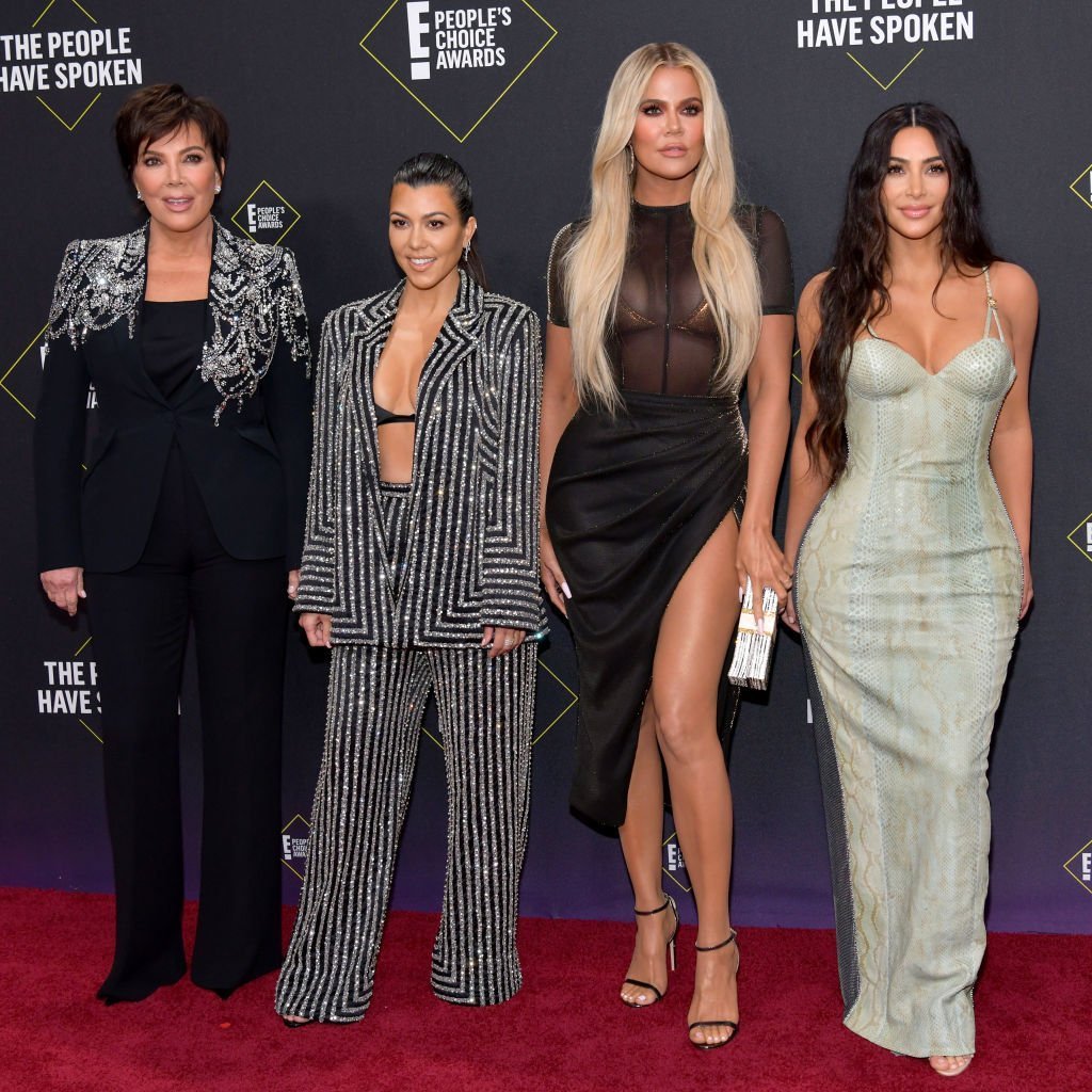 Kris Jenner with her daughters, Kourtney, Khloe, and Kim Kardashian attending the E! People's Choice Awards on November 10, 2019. | Photo: Getty Images 