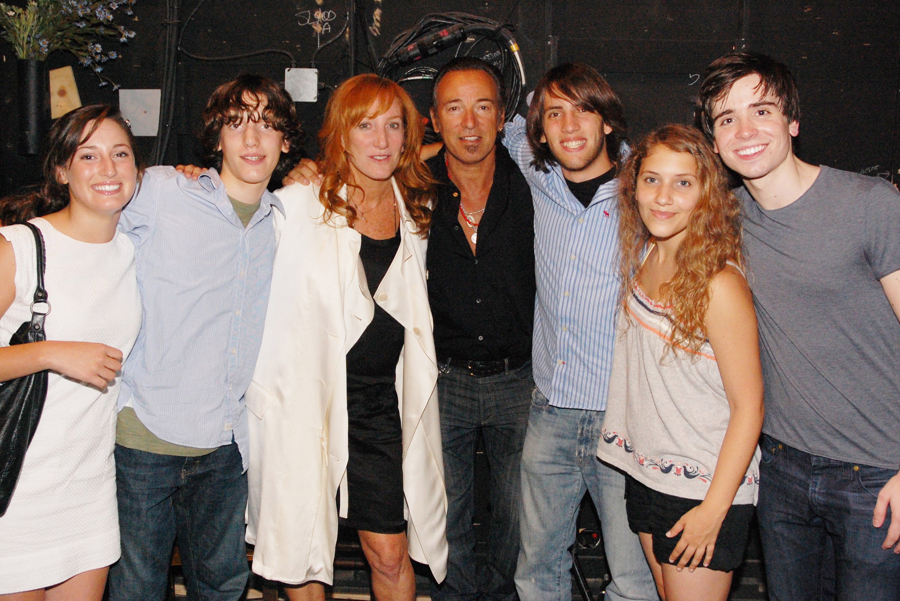 Jessica Rae Springsteen, Sam Ryan Springsteen, Patti Scialfa, Bruce Springsteen, Evan James Springsteen, and "Spring Awakening" actors Eryn Murman and Matt Doylebackstage at The Eugene O'Neill Theater in 2008 in New York City. | Source: Getty Images