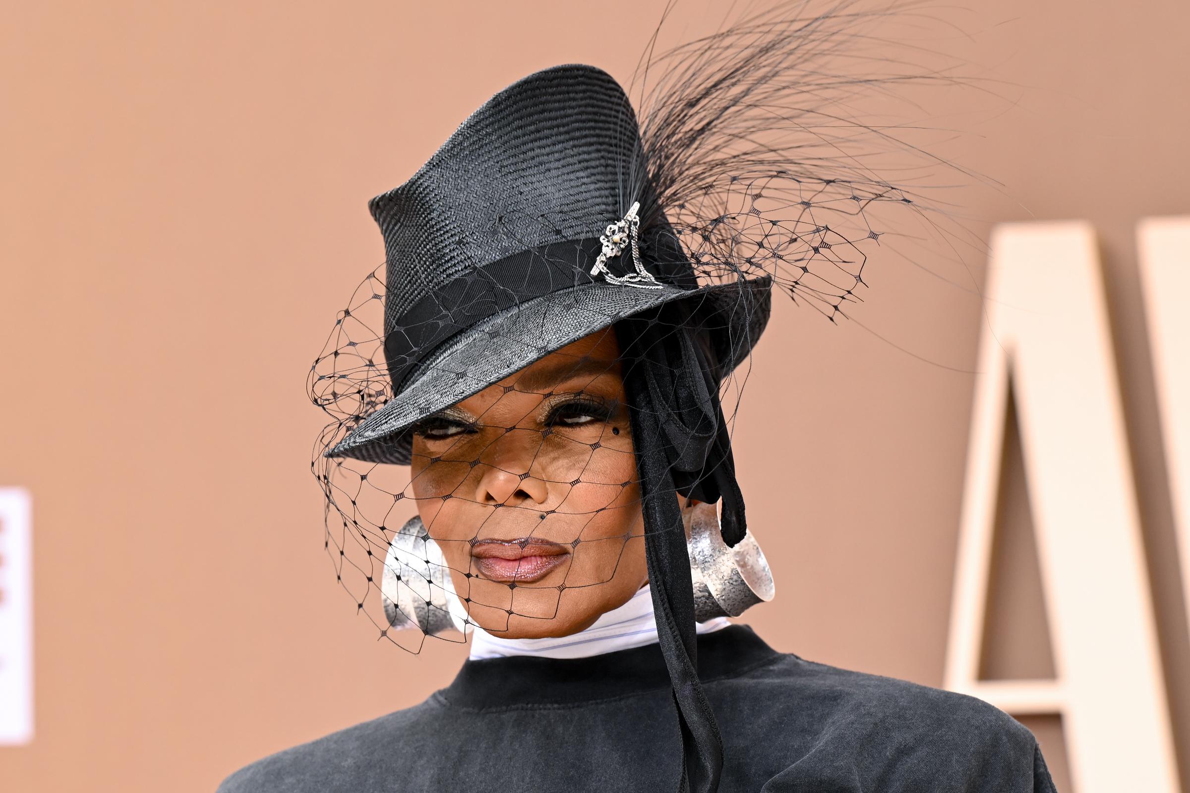 A close-up of Janet Jackson wearing a veiled fedora during her appearance at the 2026 BET Awards. | Source: Getty Images
