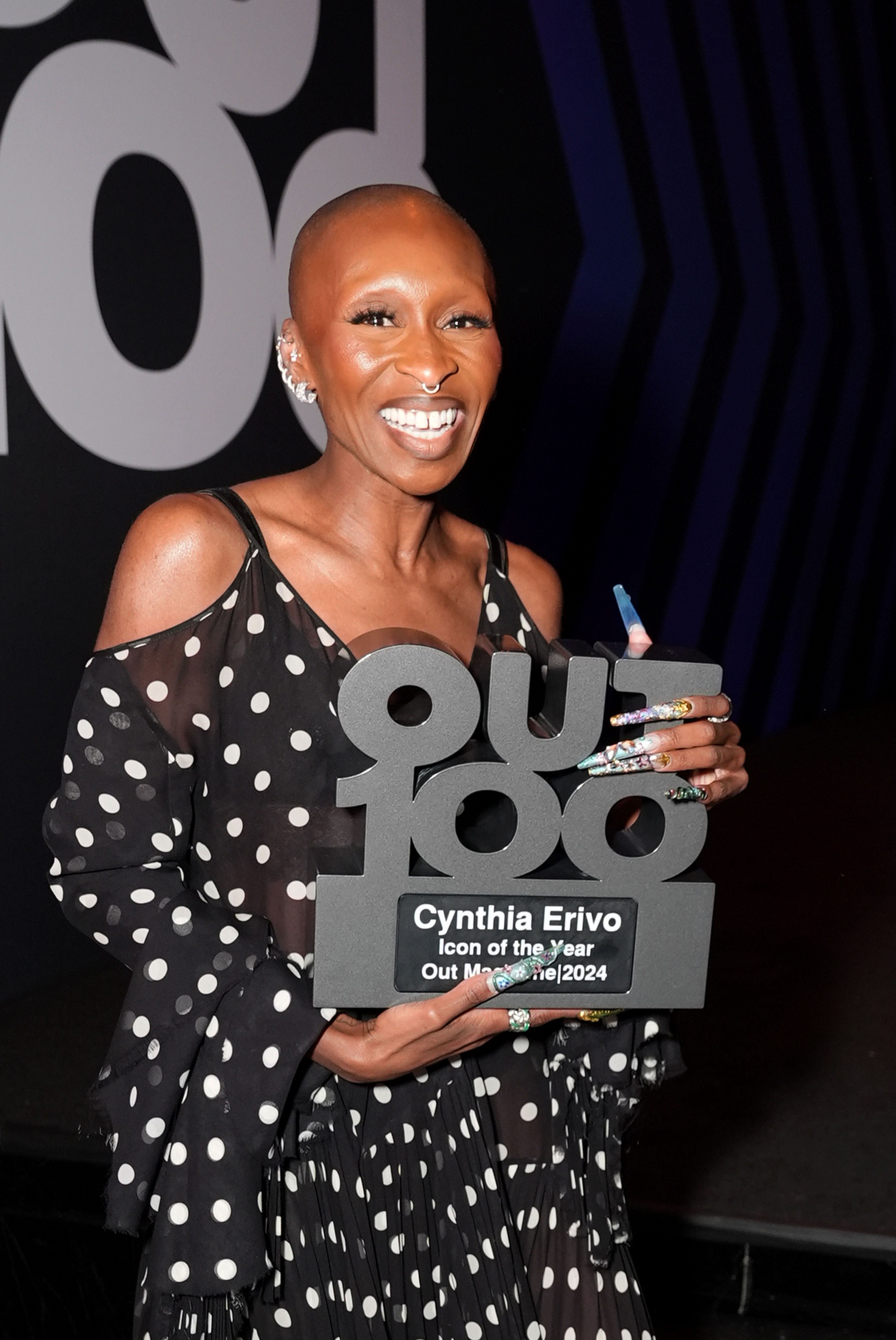 Cynthia Erivo posing with an award at the event. | Source: Getty Images