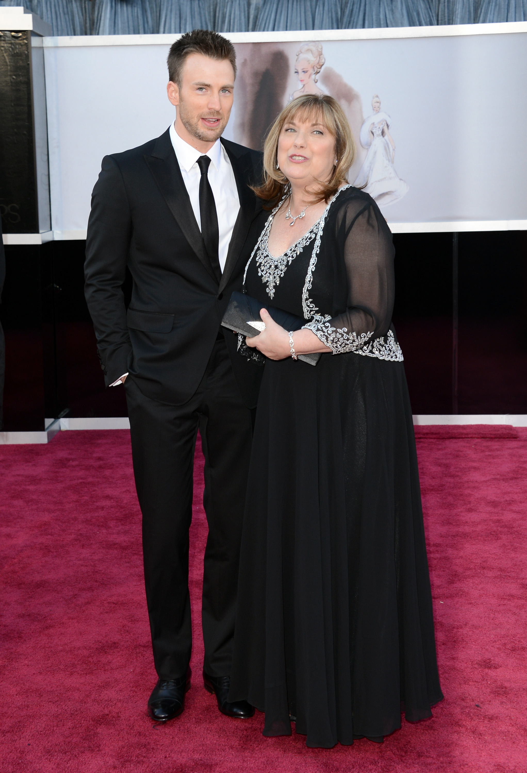 His mother worked on theater productions in the community. At this event, Chris Evans and Lisa Evans arrived at the Oscars at Hollywood & Highland Center on February 24, 2013, in Hollywood, California. | Source: Getty Images