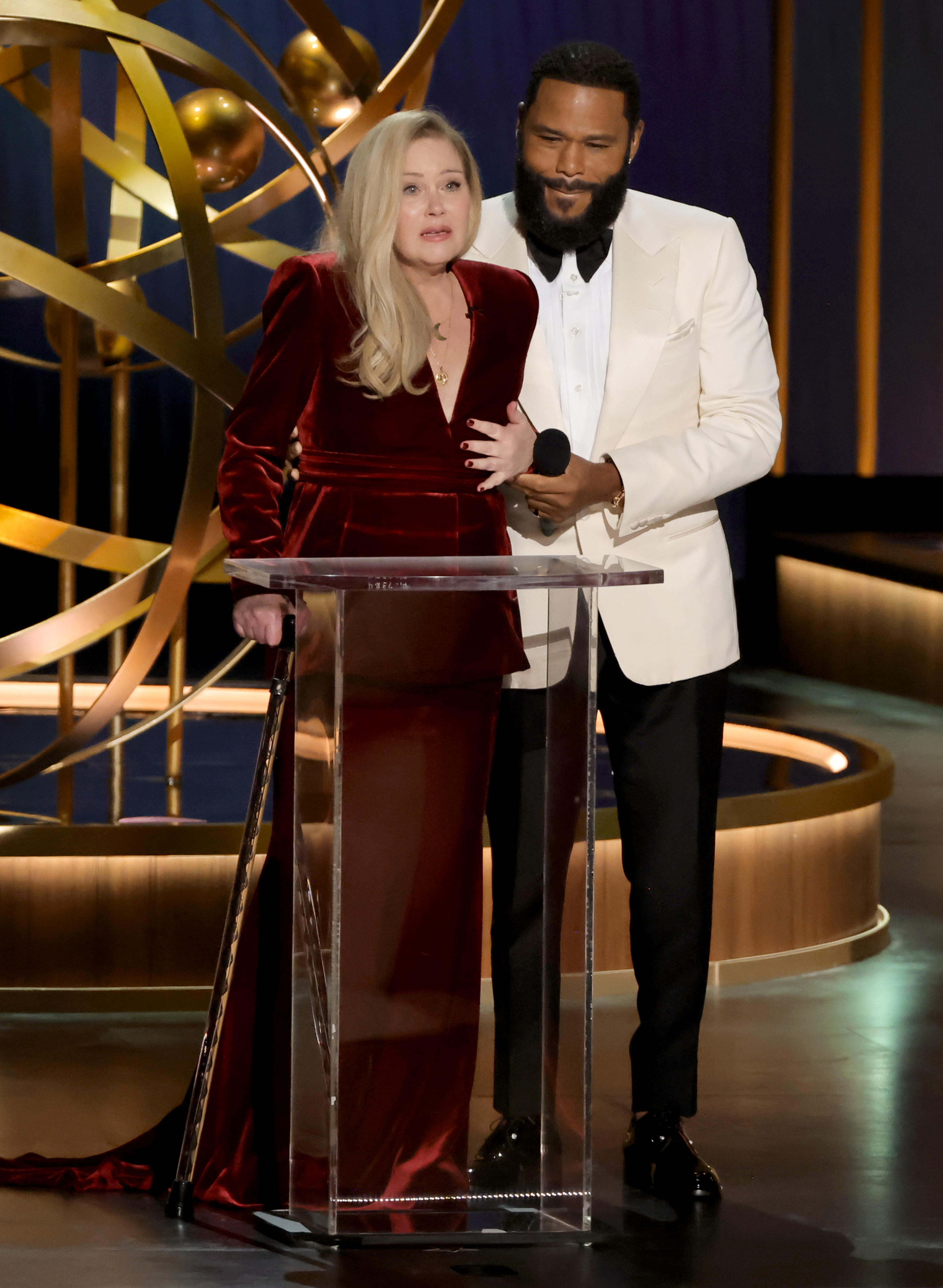 Christina Applegate and host Anthony Anderson speak onstage during the 75th Primetime Emmy Awards at Peacock Theater in Los Angeles, California on January 15, 2024. | Source: Getty Images