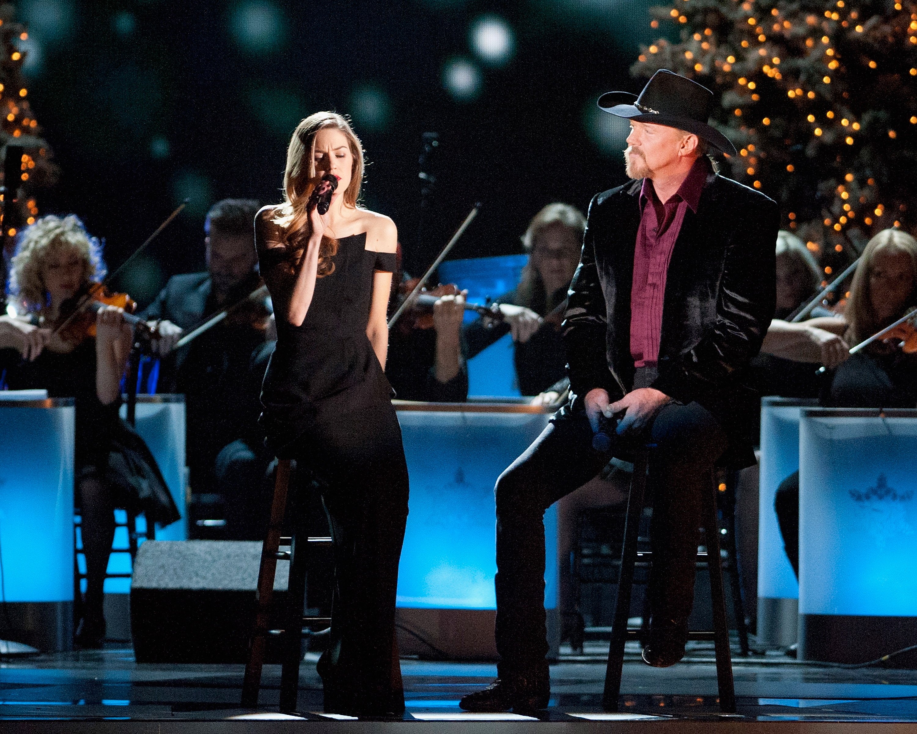 Lily Costner and Trace Adkins perform during the CMA 2013 Country Christmas on November 8, 2013, in Nashville, Tennessee. | Source: Getty Images